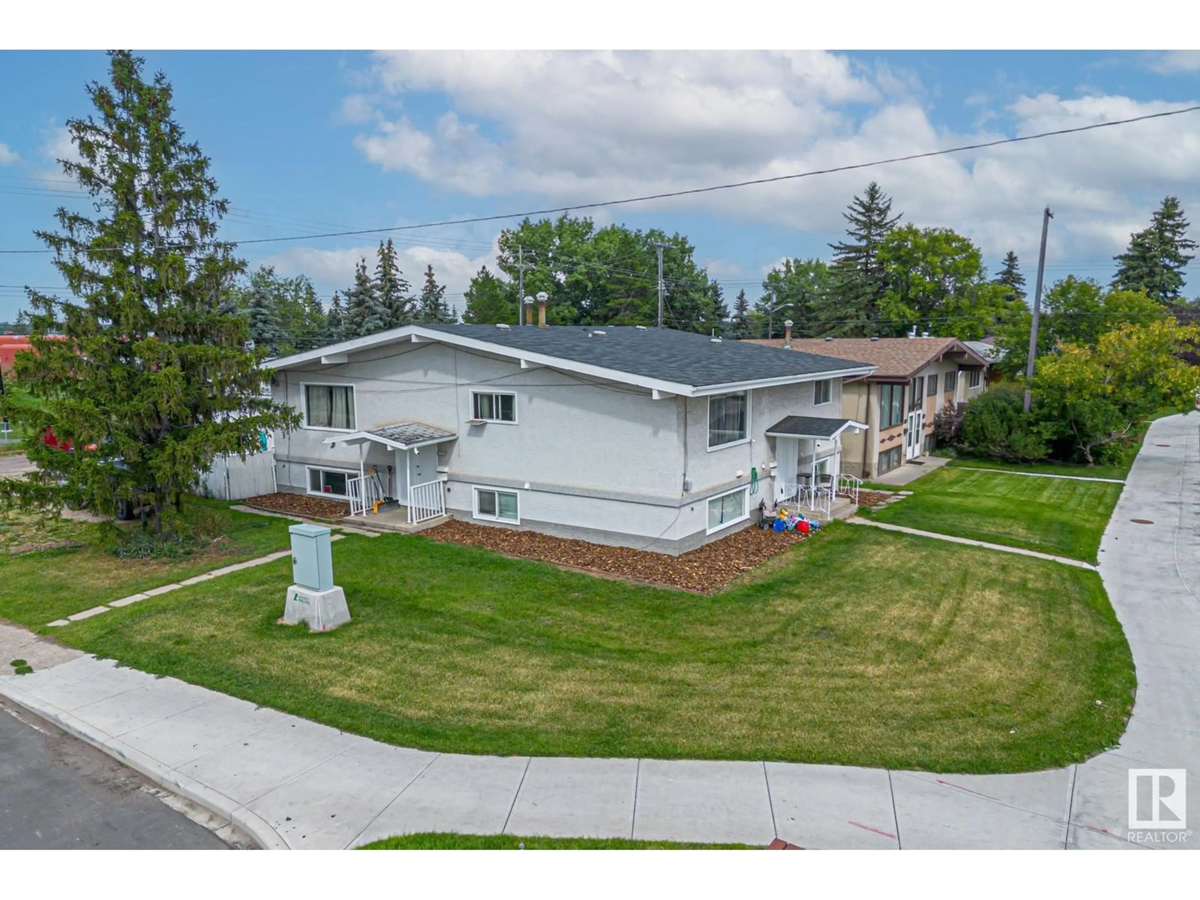 A pic from outside/outdoor area/front of a property/back of a property/a pic from drone, street for 6120 132 AV, Edmonton Alberta T5A0J3