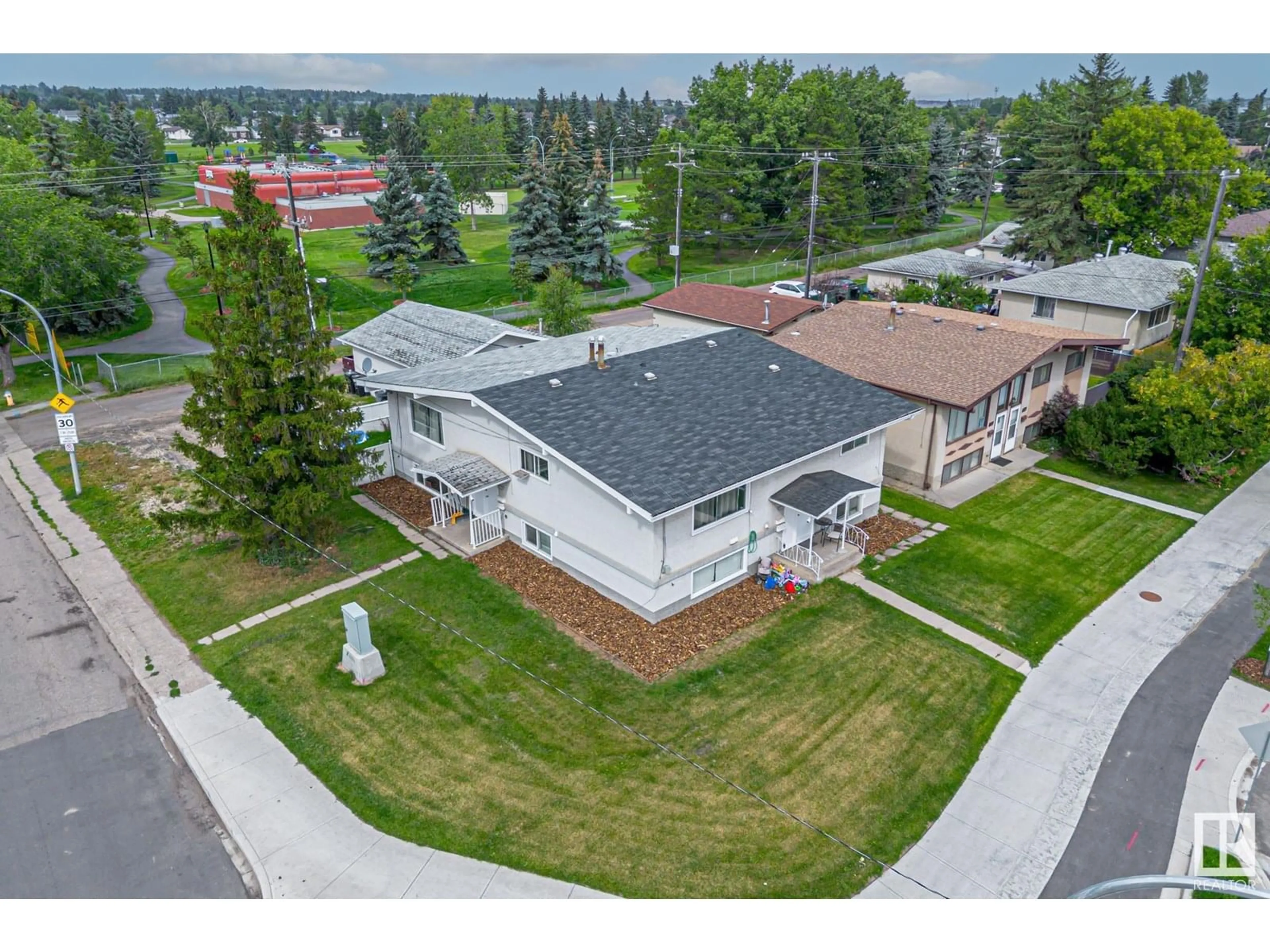 A pic from outside/outdoor area/front of a property/back of a property/a pic from drone, unknown for 6120 132 AV, Edmonton Alberta T5A0J3