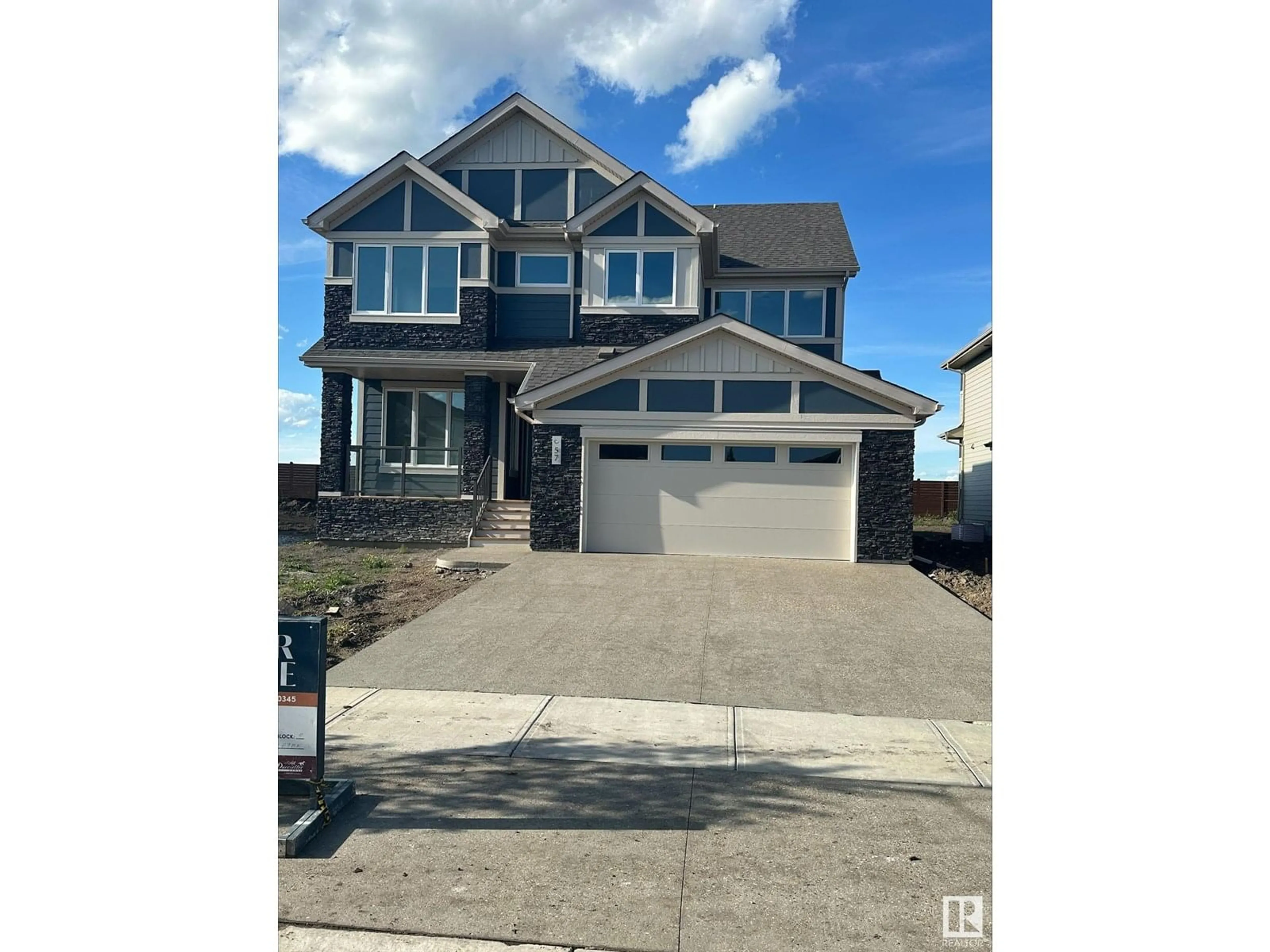 Home with vinyl exterior material, street for 57 JUBILATION DR, St. Albert Alberta T8N7V4