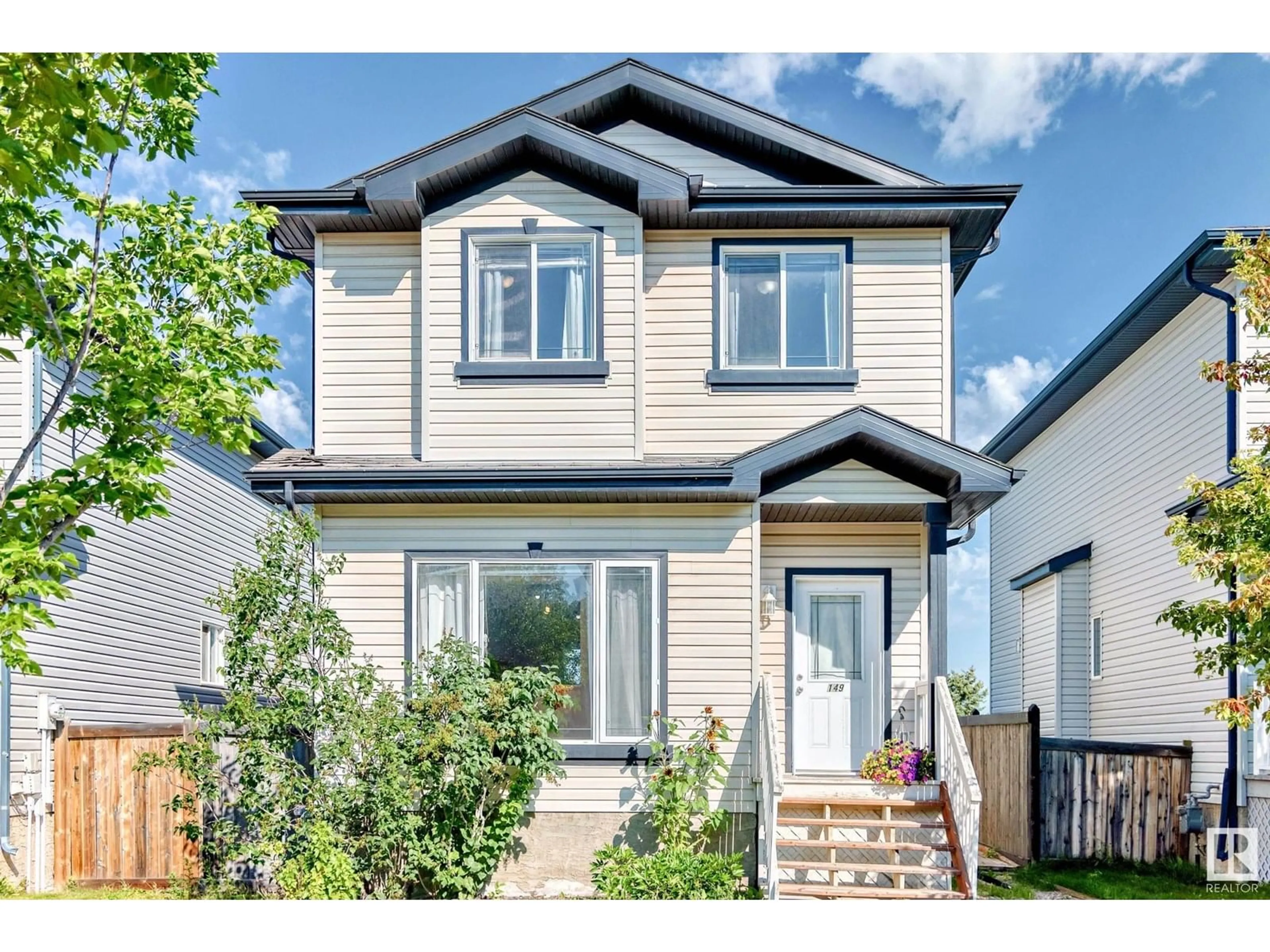 Home with vinyl exterior material, street for 149 BRIDGEPORT BV, Leduc Alberta T9E0H8