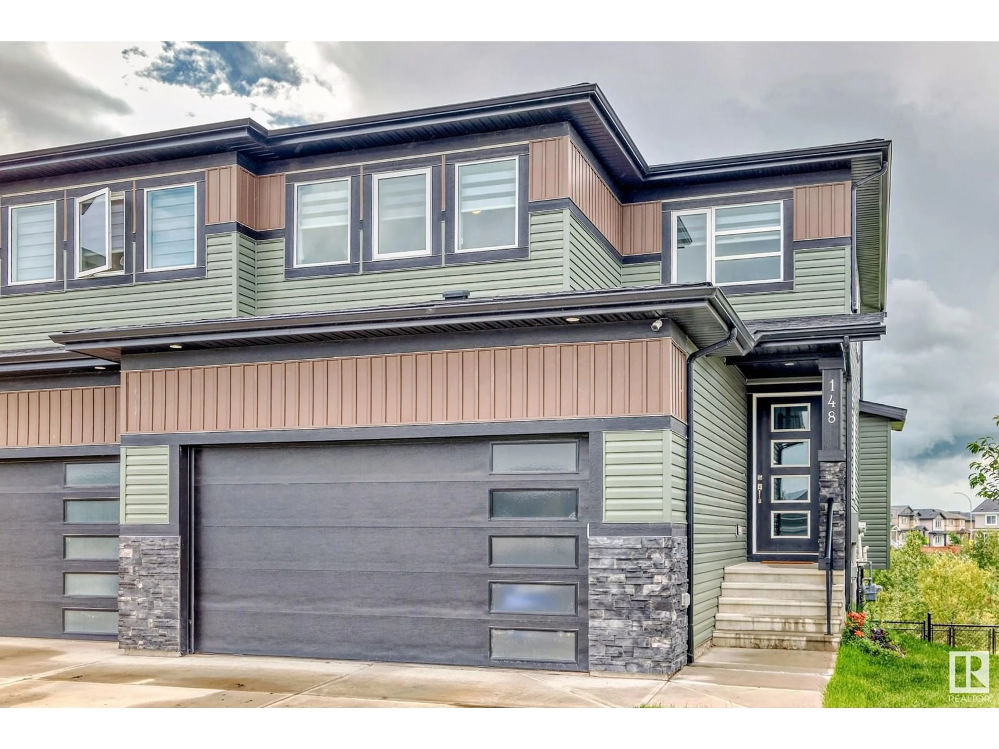 Home with vinyl exterior material, street for 148 ASTON BN, Leduc Alberta T9E1L9