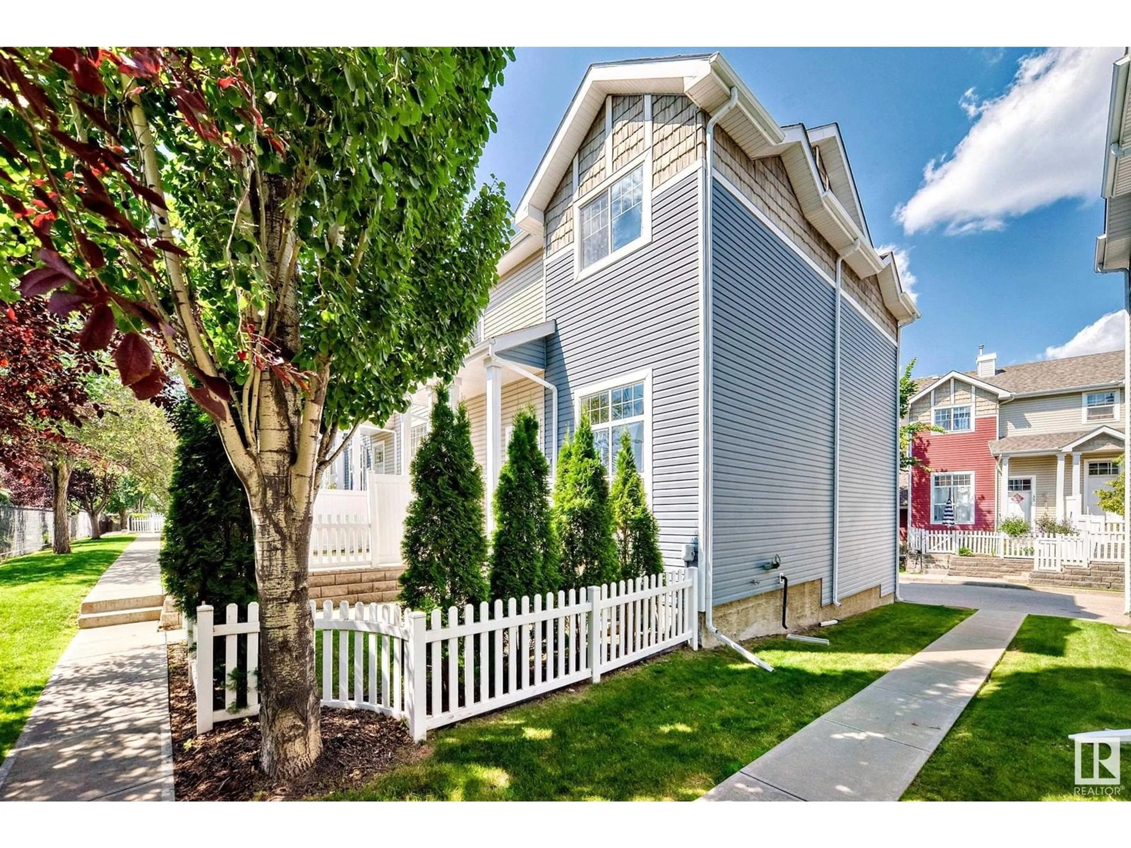 Home with vinyl exterior material, street for 55 - 5604 199 ST NW, Edmonton Alberta T6M2Z9