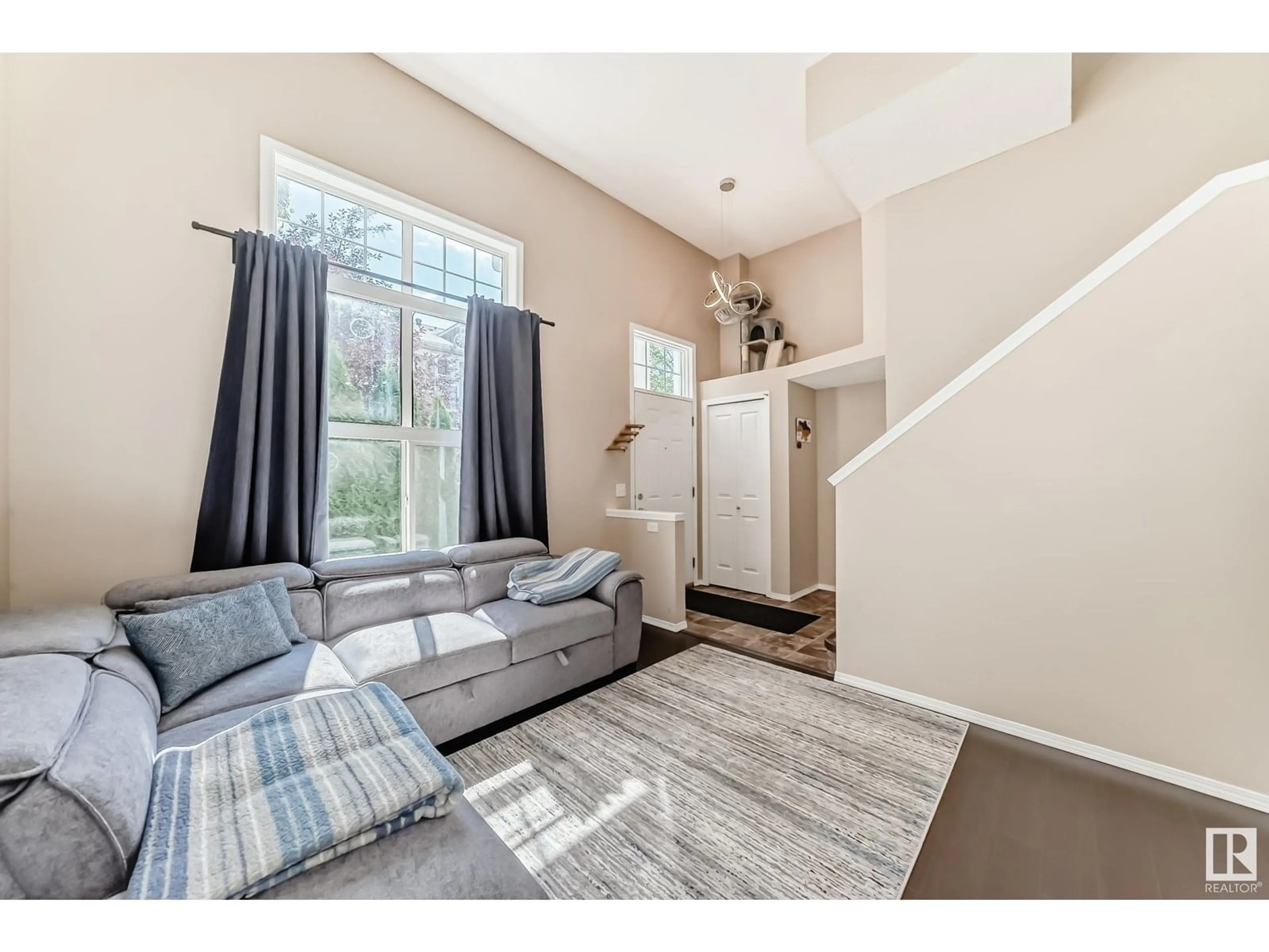 Living room with furniture, unknown for 55 - 5604 199 ST NW, Edmonton Alberta T6M2Z9