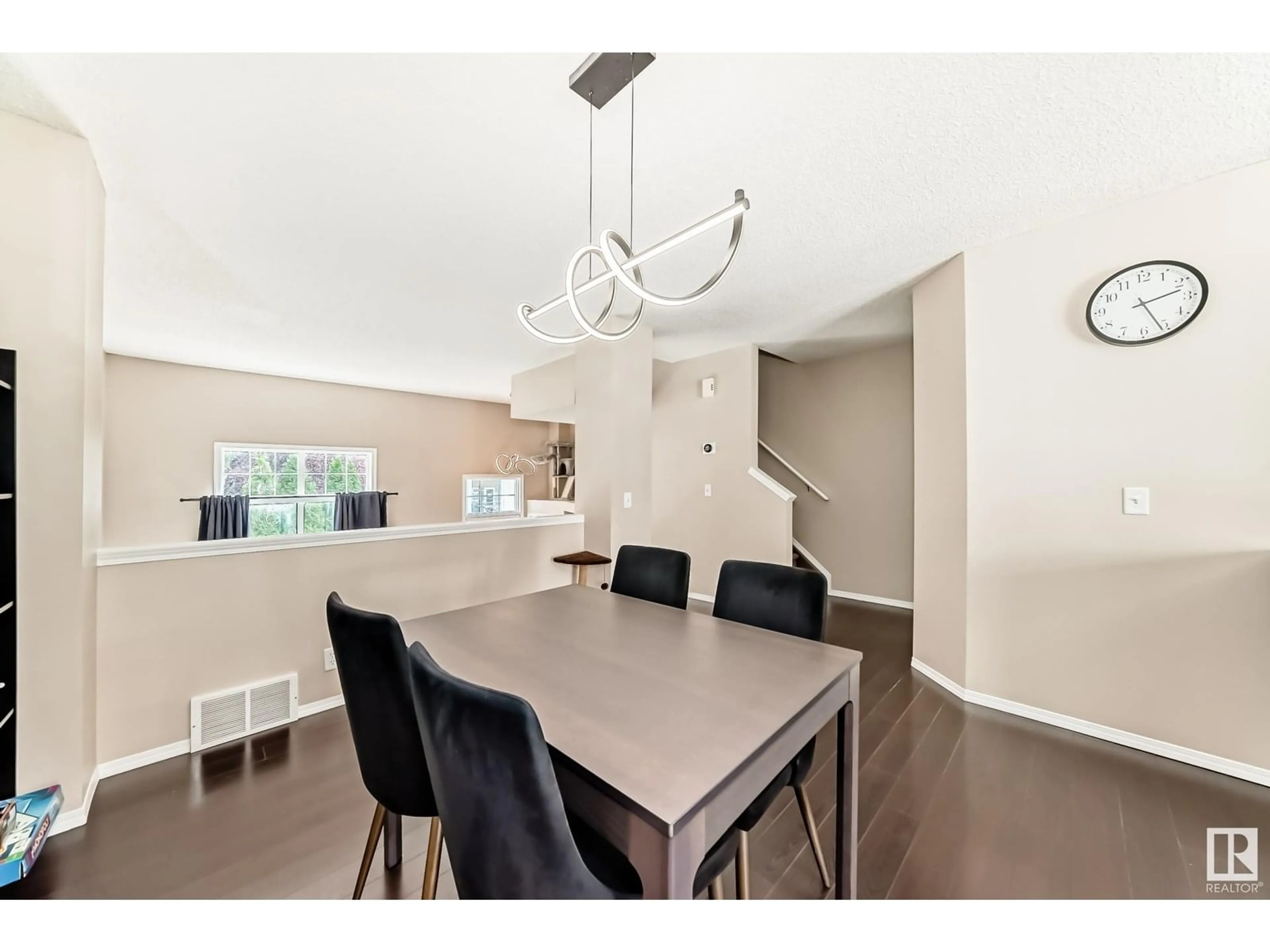 Dining room, wood/laminate floor for 55 - 5604 199 ST NW, Edmonton Alberta T6M2Z9
