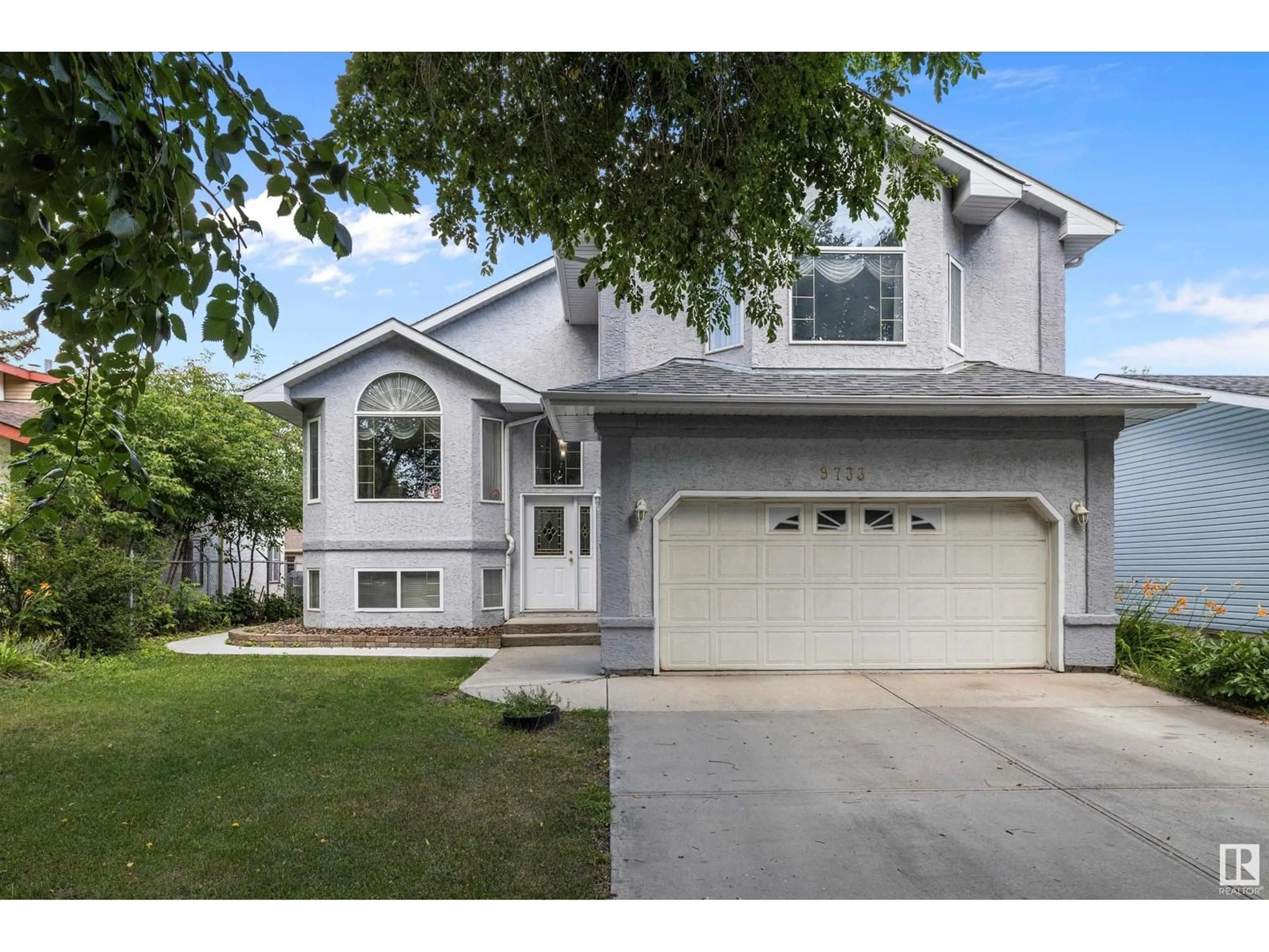 Home with vinyl exterior material, street for NW - 9733 150 ST, Edmonton Alberta T5P1N5