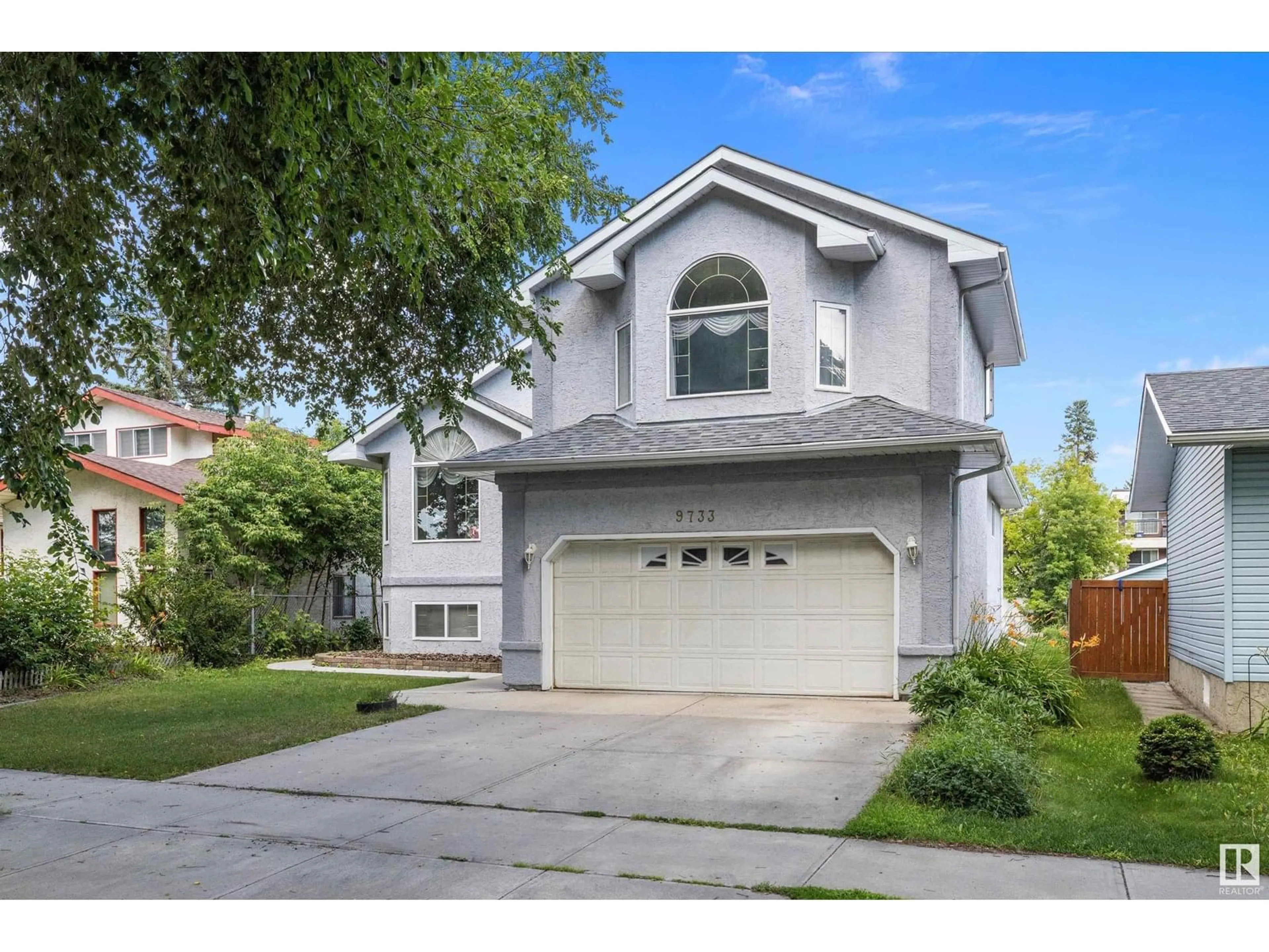 Home with vinyl exterior material, street for NW - 9733 150 ST, Edmonton Alberta T5P1N5