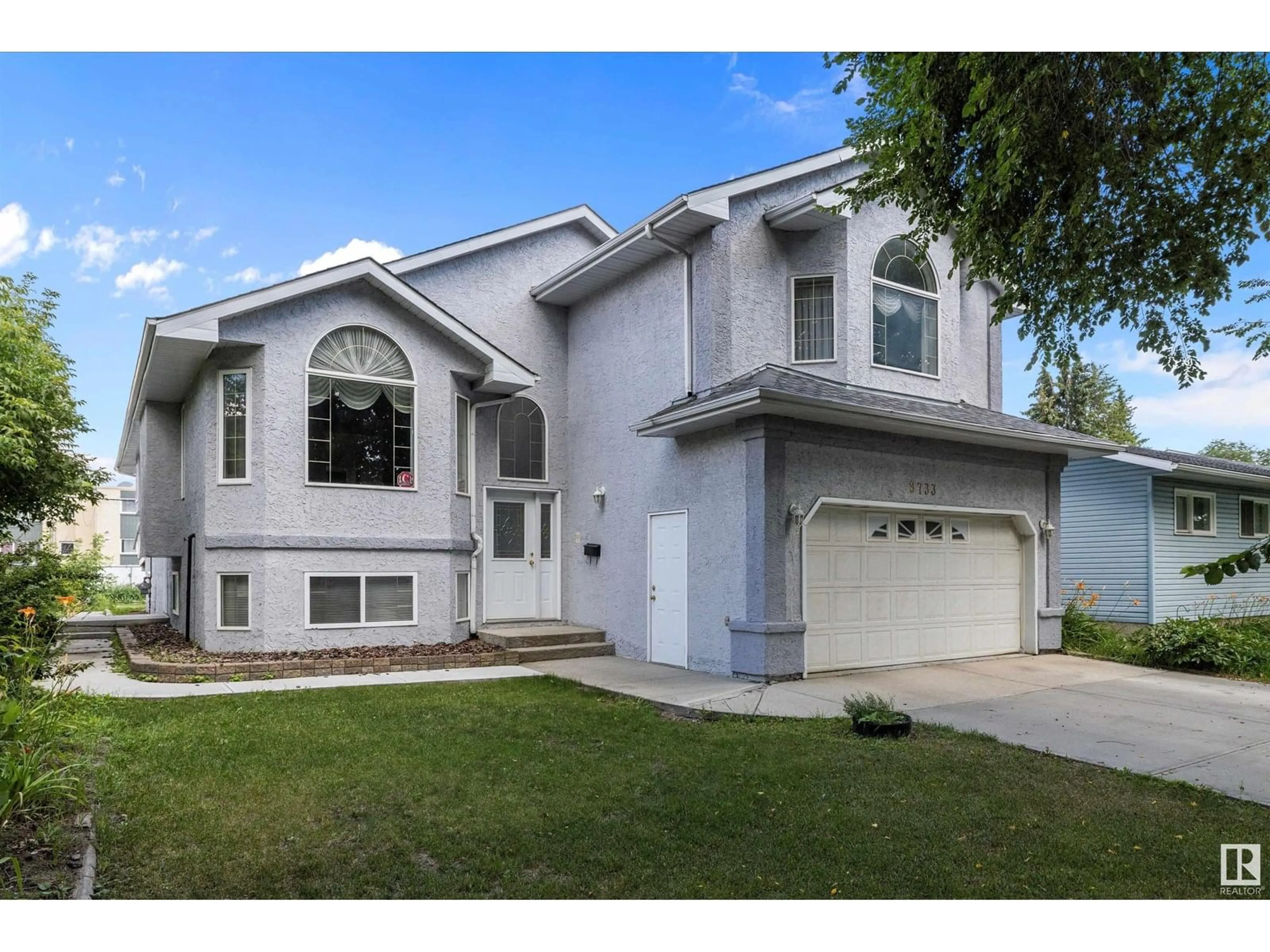 Home with vinyl exterior material, street for NW - 9733 150 ST, Edmonton Alberta T5P1N5