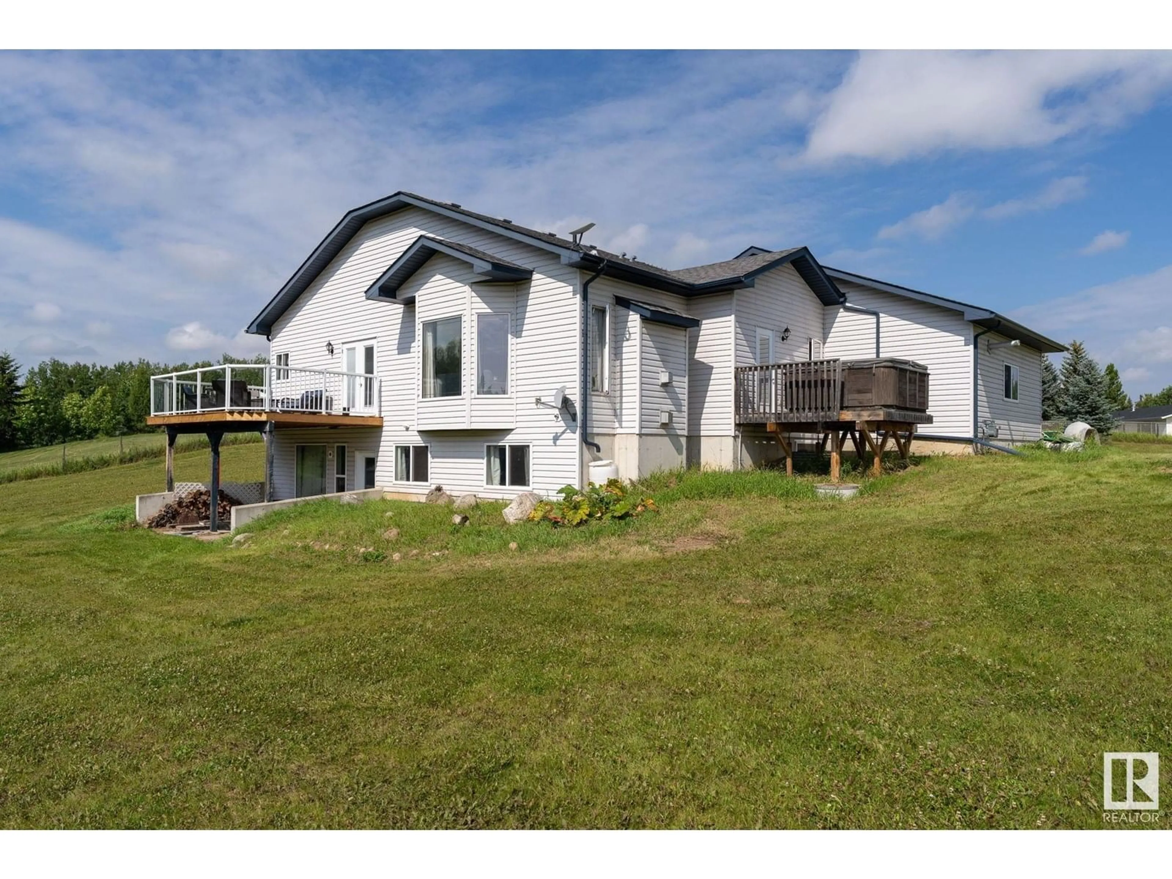A pic from outside/outdoor area/front of a property/back of a property/a pic from drone, building for #3 - 53111 RGE ROAD 30, Rural Parkland County Alberta T7Y2M8