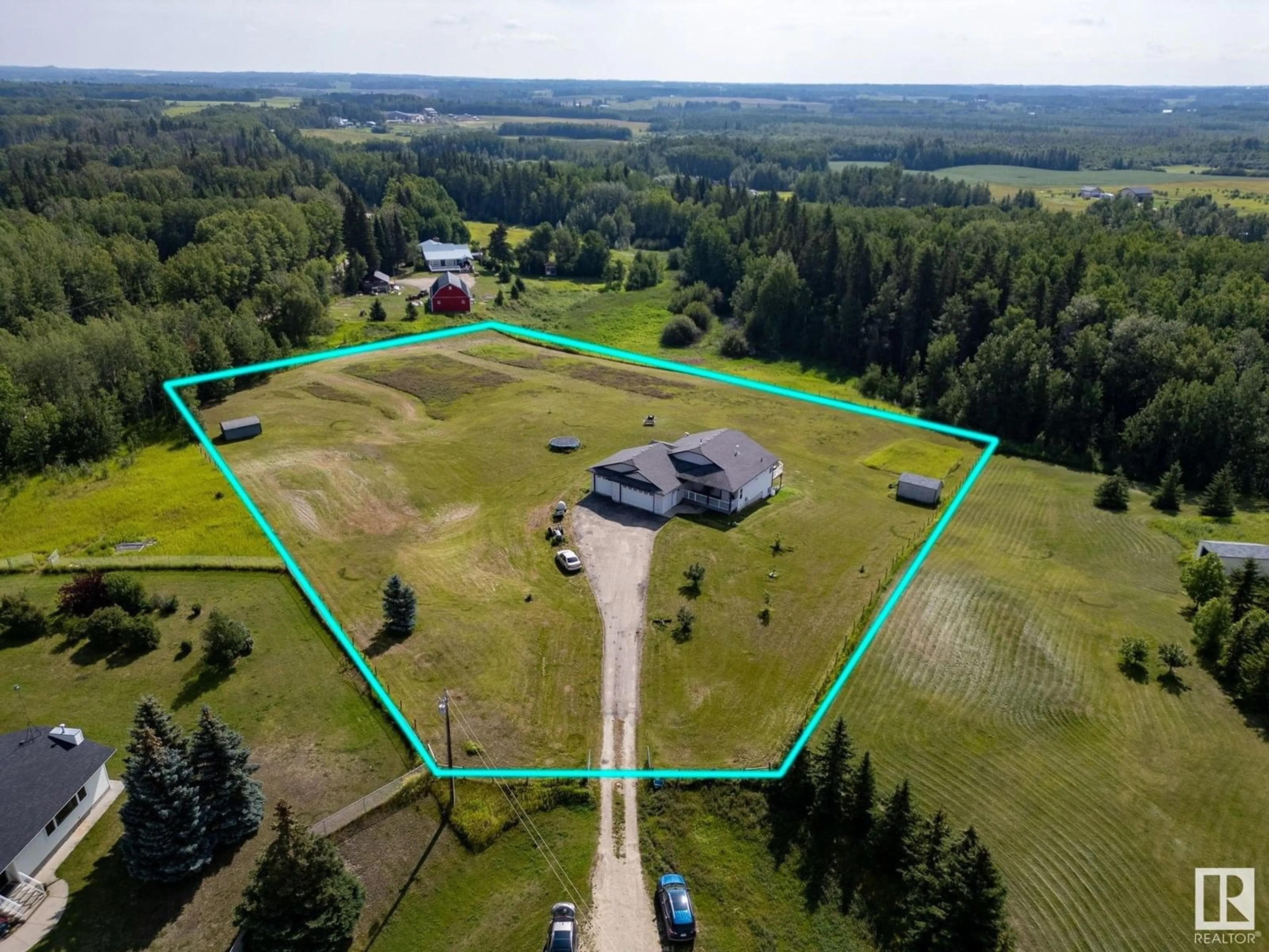 A pic from outside/outdoor area/front of a property/back of a property/a pic from drone, building for #3 - 53111 RGE ROAD 30, Rural Parkland County Alberta T7Y2M8