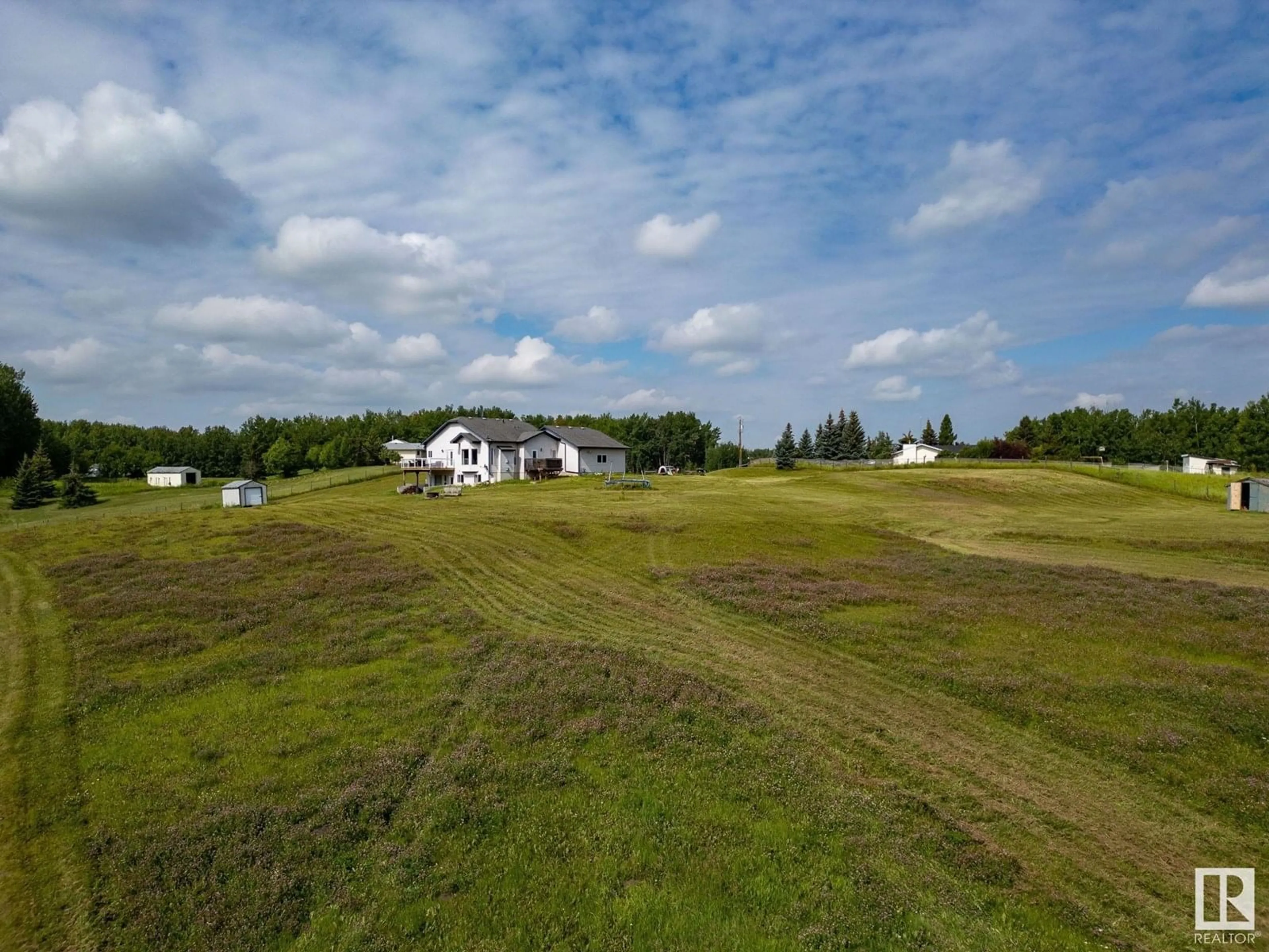 A pic from outside/outdoor area/front of a property/back of a property/a pic from drone, unknown for #3 - 53111 RGE ROAD 30, Rural Parkland County Alberta T7Y2M8
