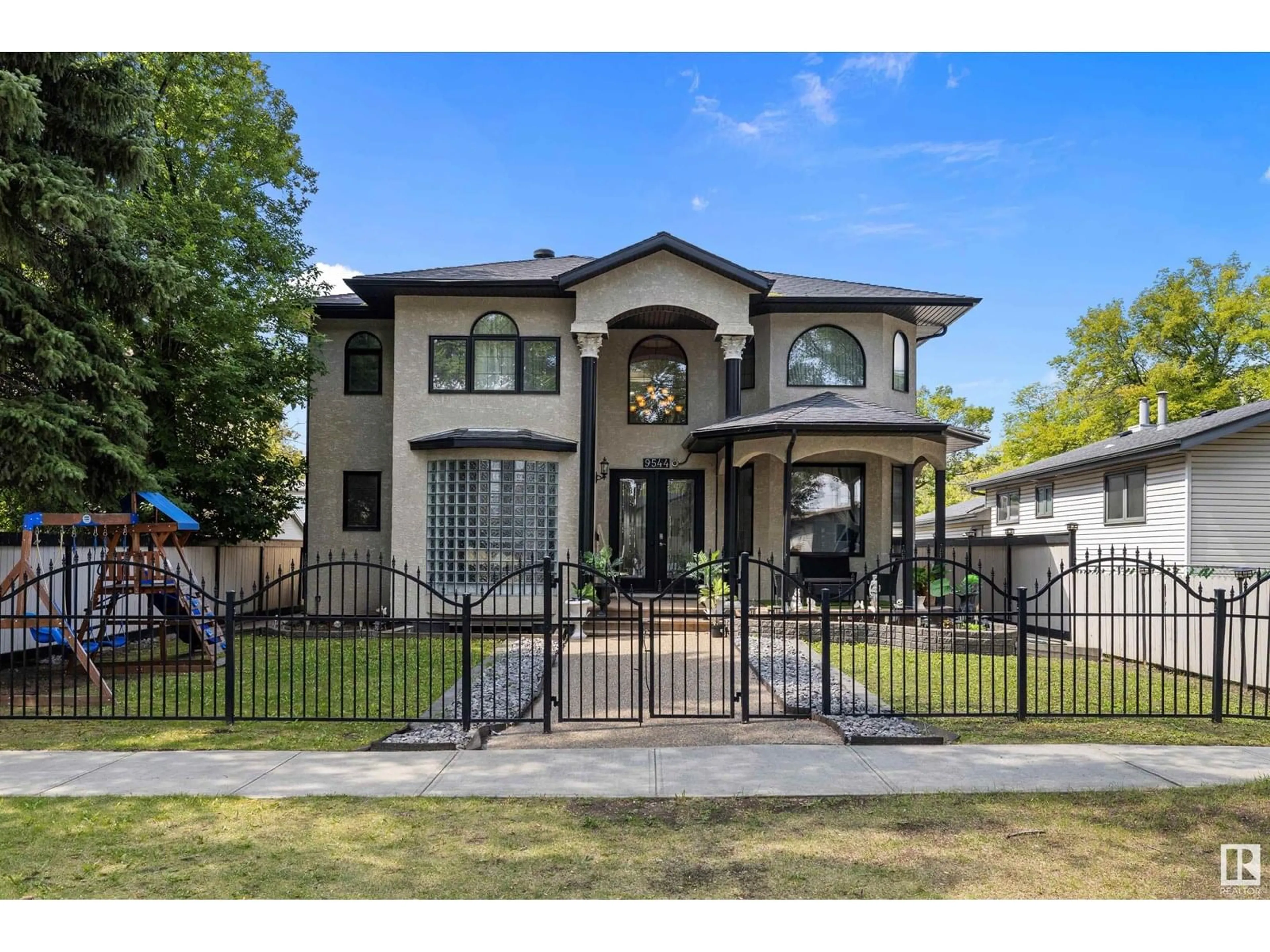 Home with brick exterior material, street for NW - 9544 154 ST, Edmonton Alberta T5P2E9