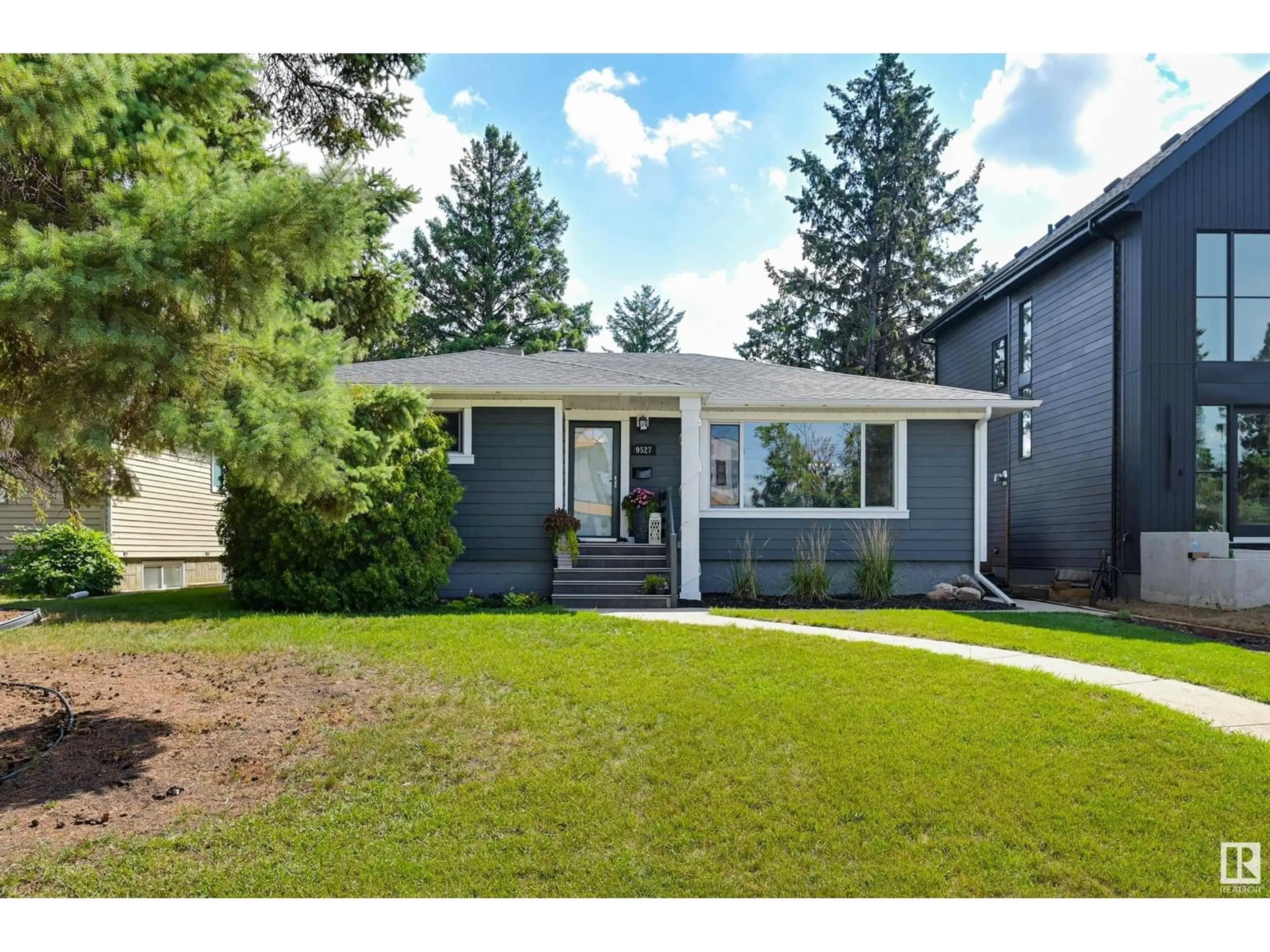 Home with vinyl exterior material, street for 9527 148 ST, Edmonton Alberta T5N3E3