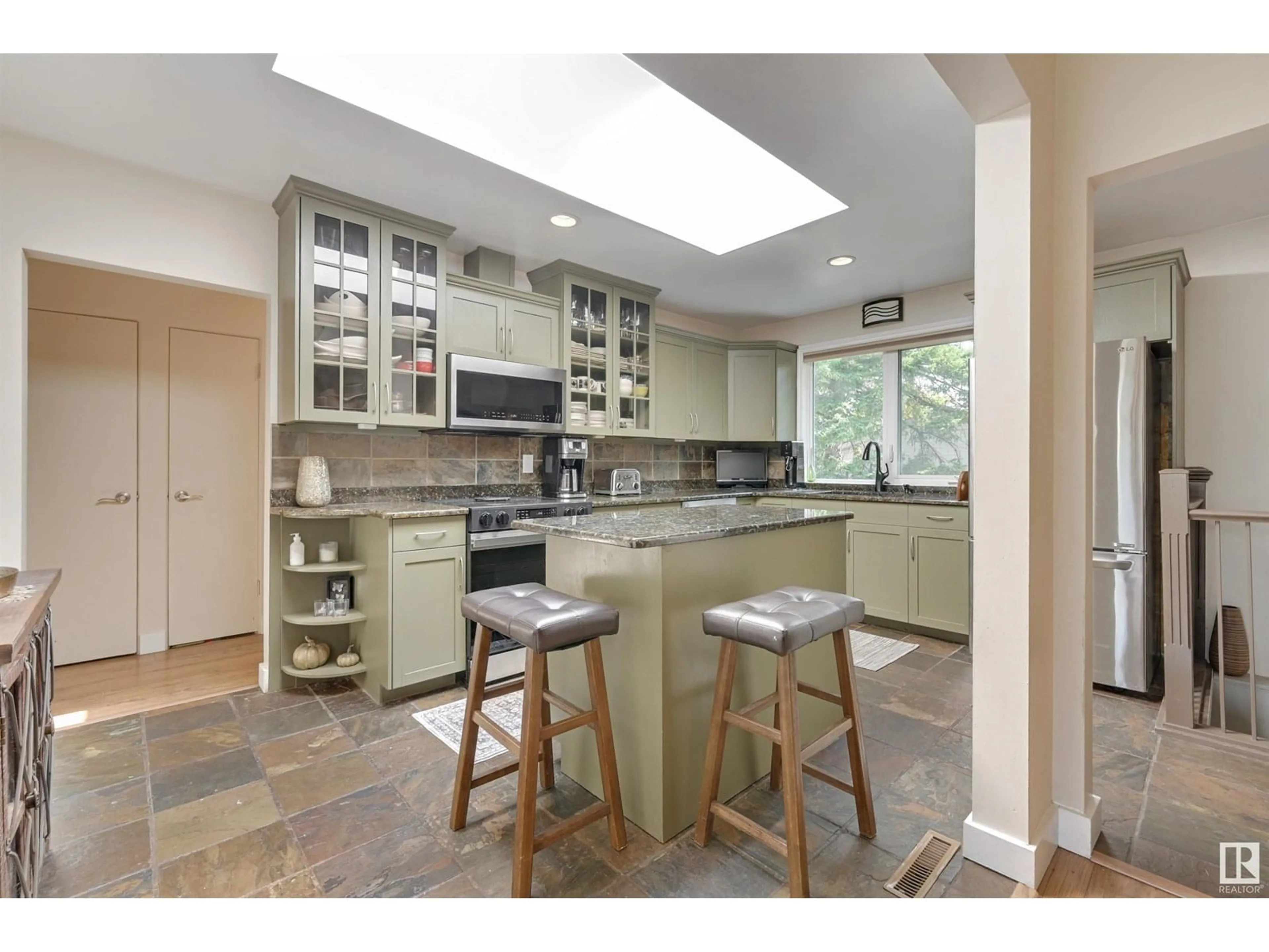 Open concept kitchen, ceramic/tile floor for 9527 148 ST, Edmonton Alberta T5N3E3