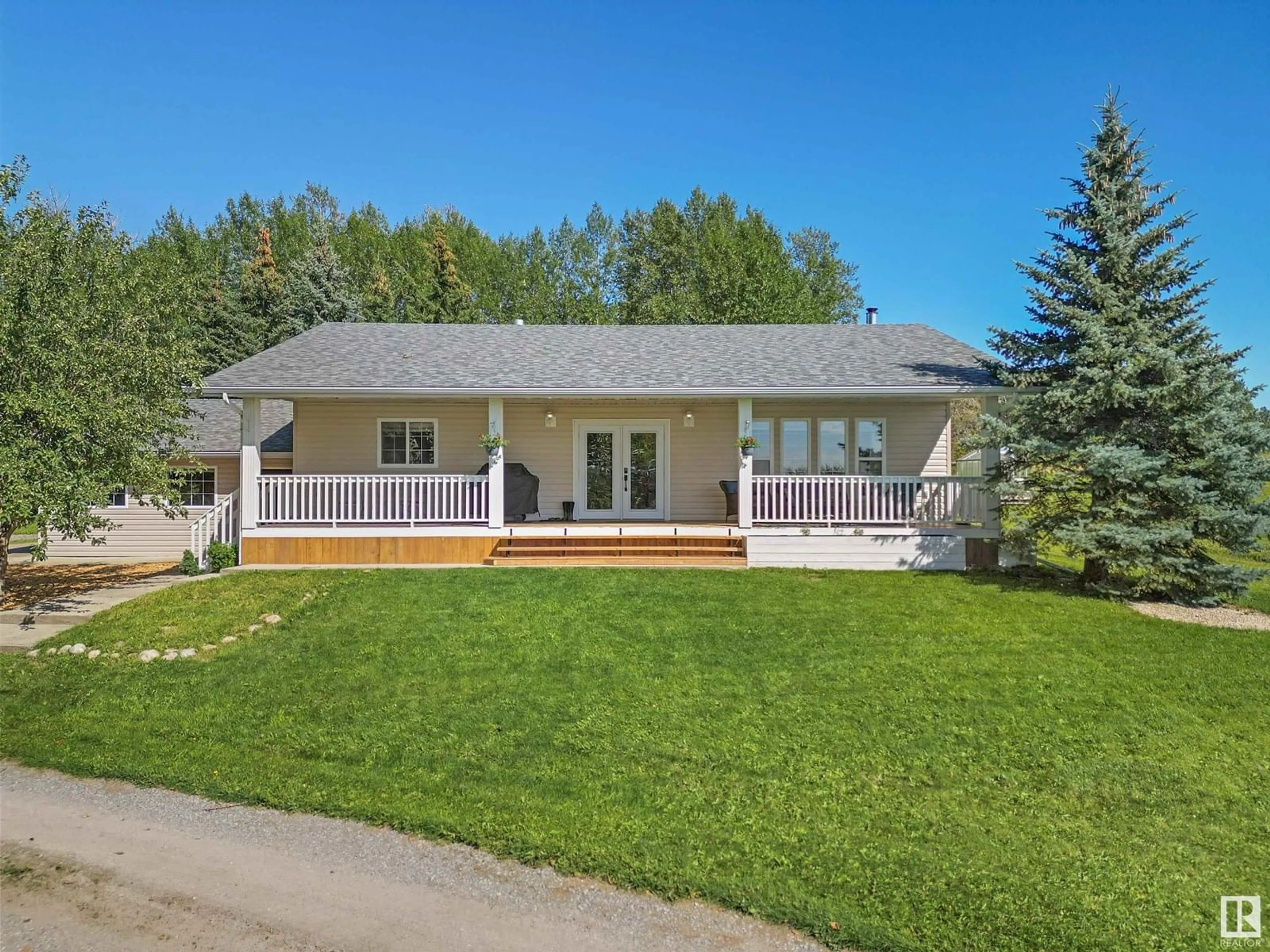 Home with vinyl exterior material, street for SW - 111 6 ST, Rural Wetaskiwin County Alberta T0C0A0