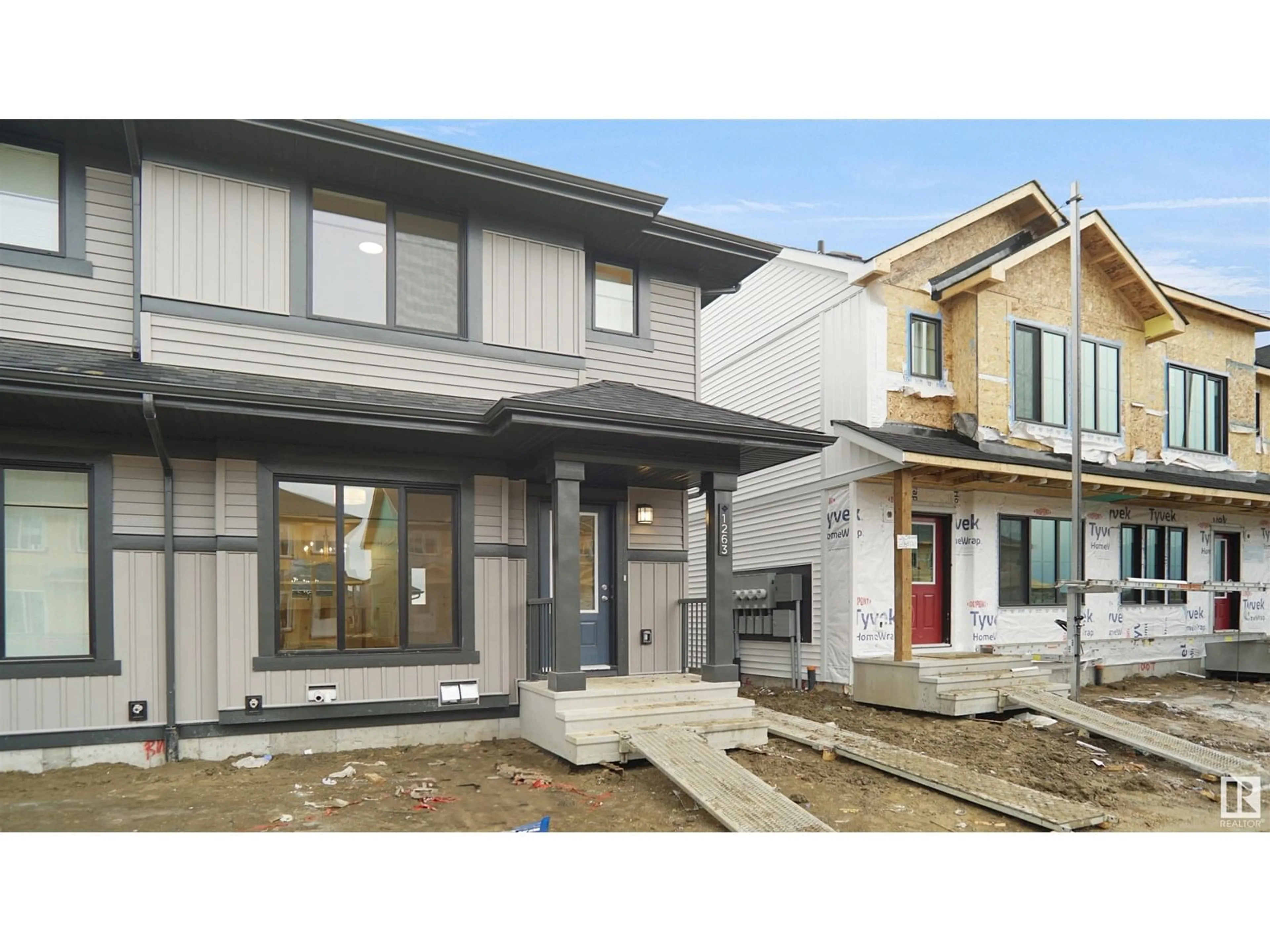 Home with vinyl exterior material, street for 1277 KESWICK DR, Edmonton Alberta T6W4K3