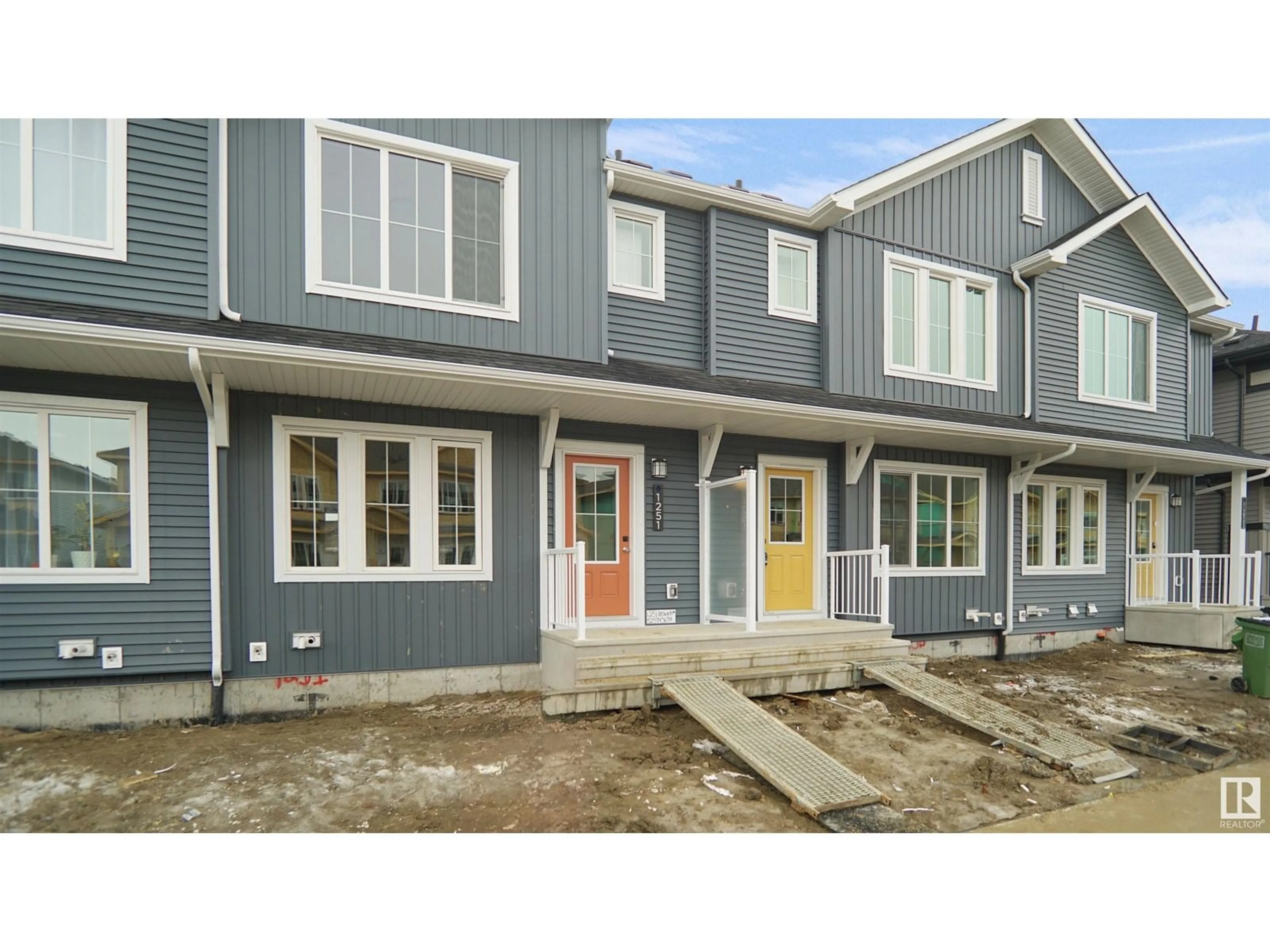Home with vinyl exterior material, street for 1299 KESWICK DR, Edmonton Alberta T6W5G5