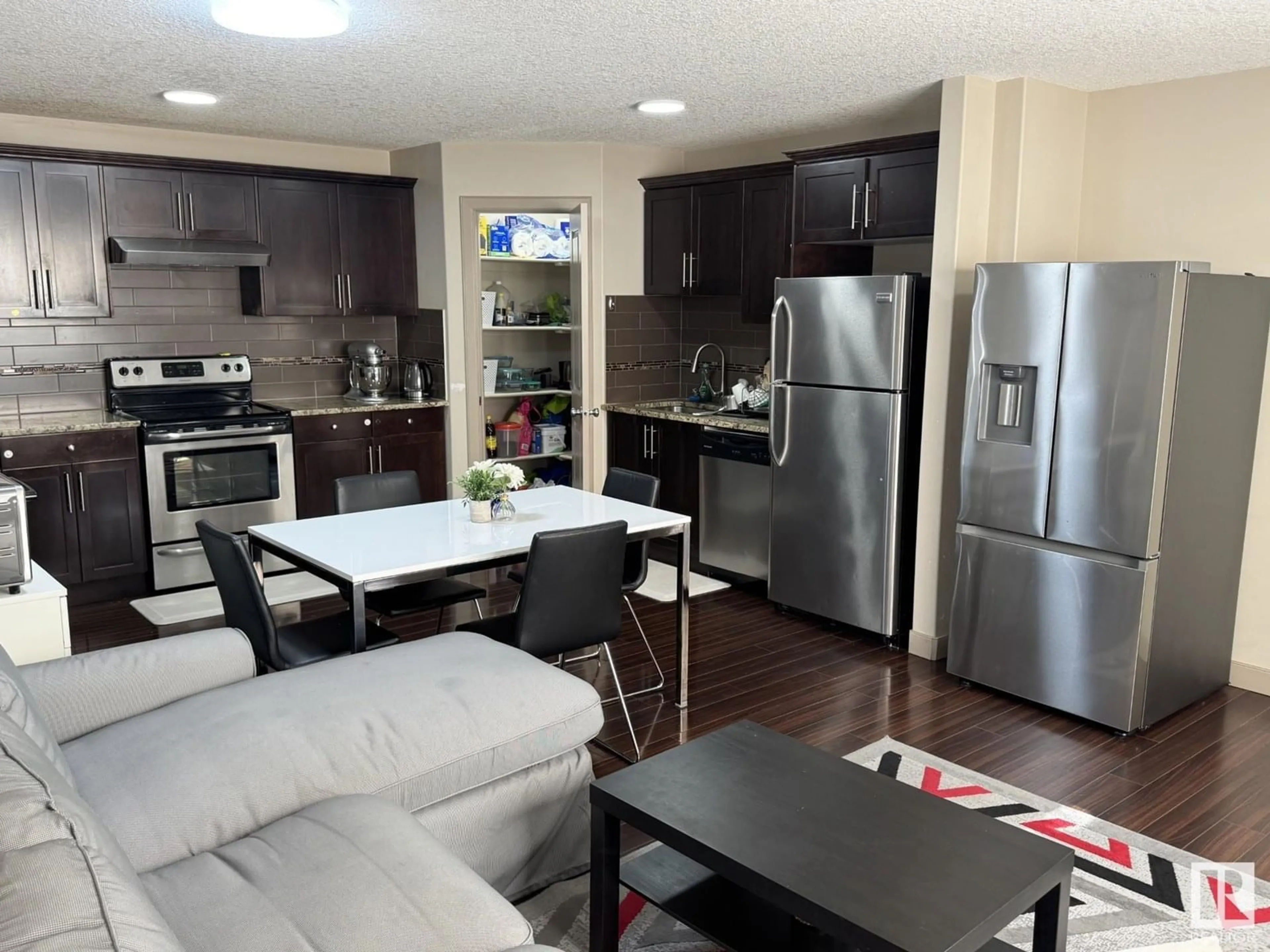 Open concept kitchen, unknown for #15 - 1820 34 AV, Edmonton Alberta T6T9N9
