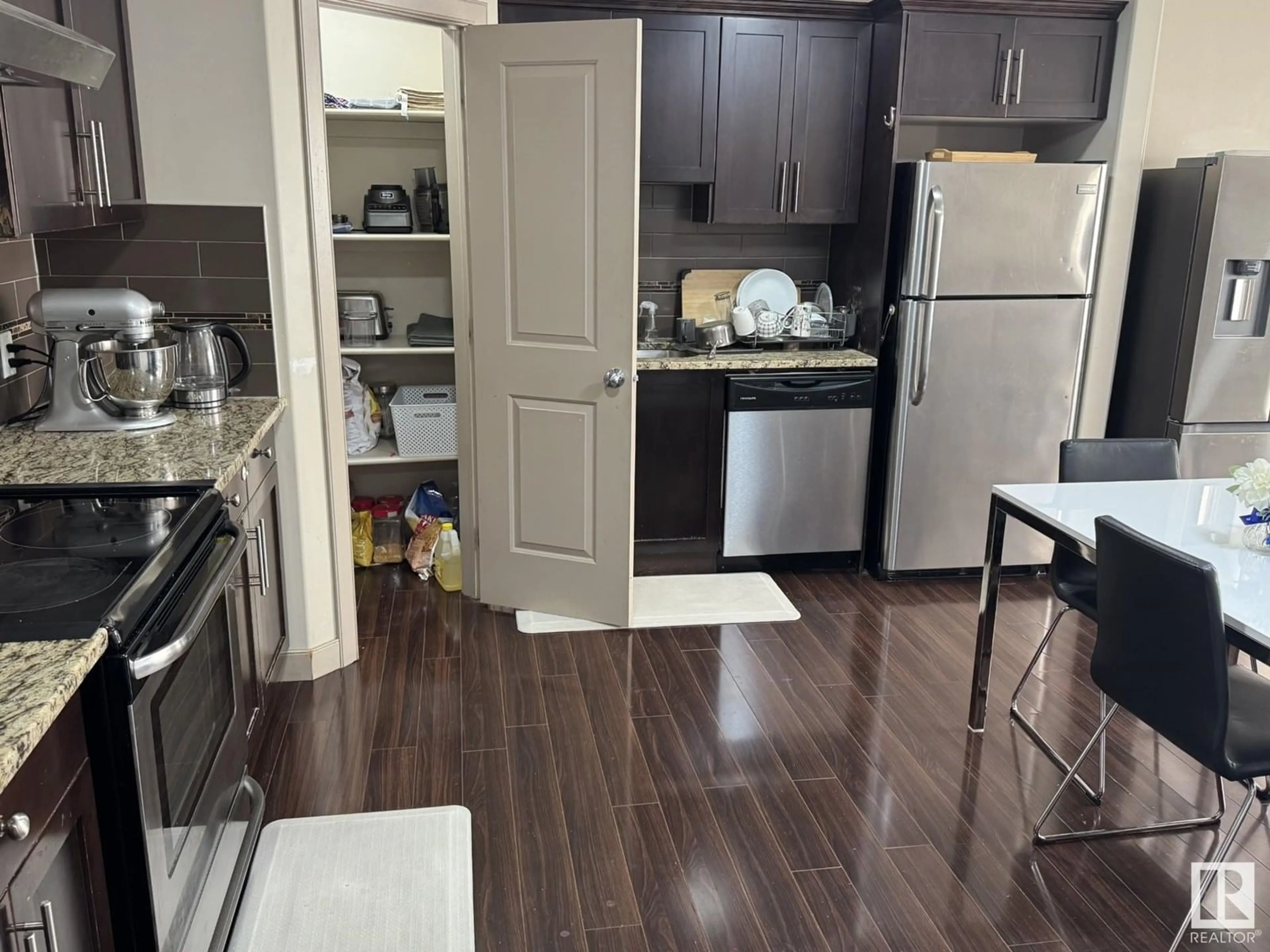 Open concept kitchen, unknown for #15 - 1820 34 AV, Edmonton Alberta T6T9N9