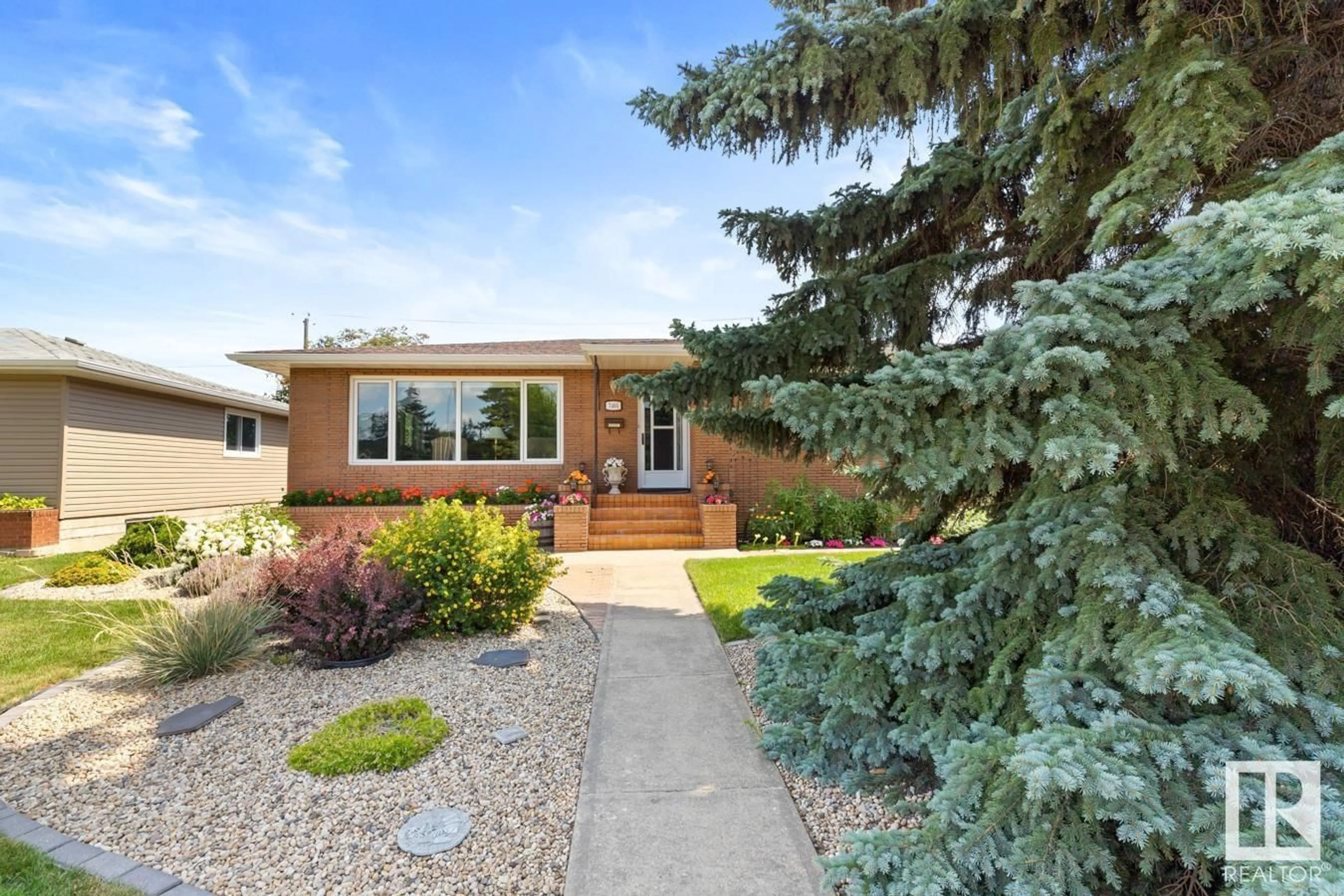 Home with vinyl exterior material, street for NW - 7405 87 AV, Edmonton Alberta T6B0L8