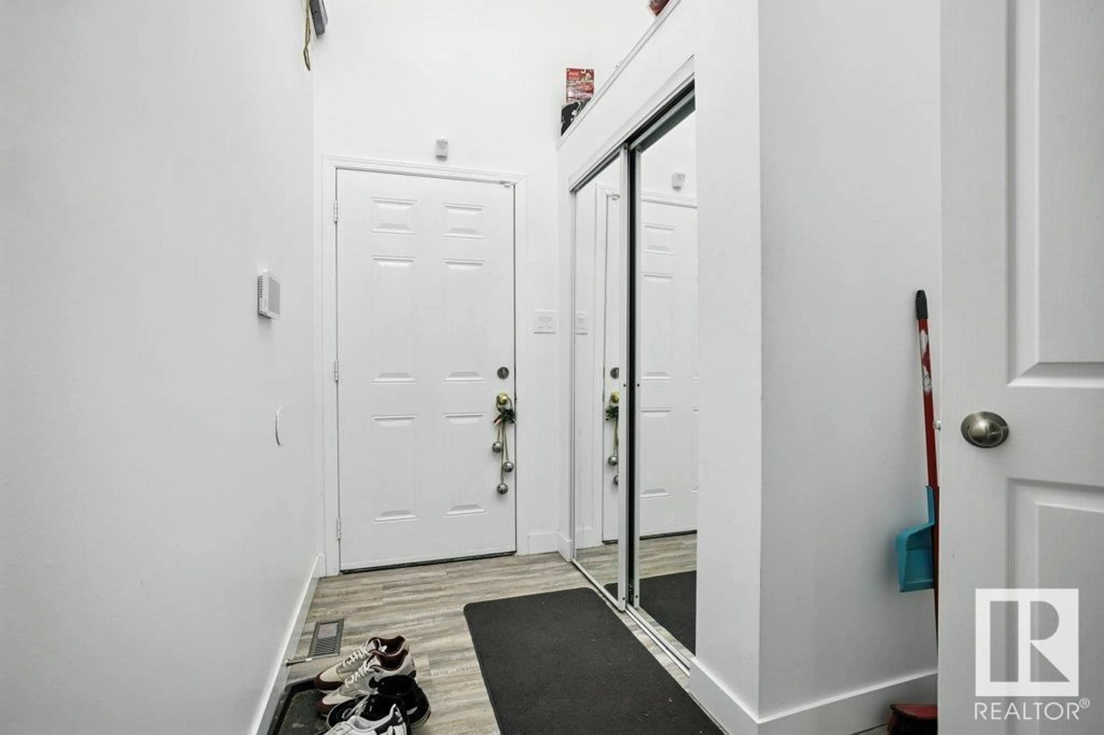 Indoor entryway for 1670 - 138 JAMHA RD, Edmonton Alberta T6L7B3