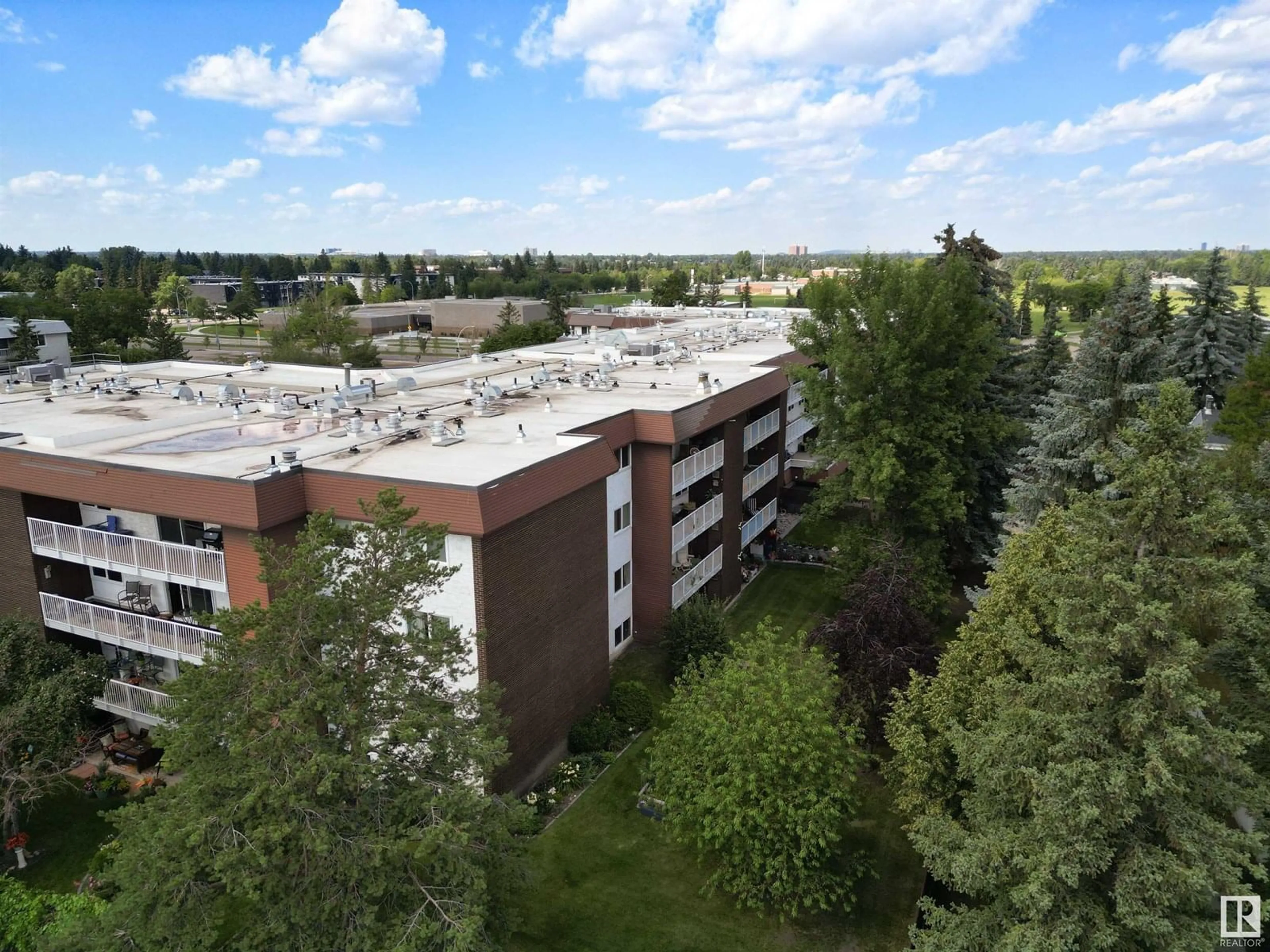 A pic from outside/outdoor area/front of a property/back of a property/a pic from drone, building for #308 - 14810 51 AVE NW, Edmonton Alberta T6H5G5