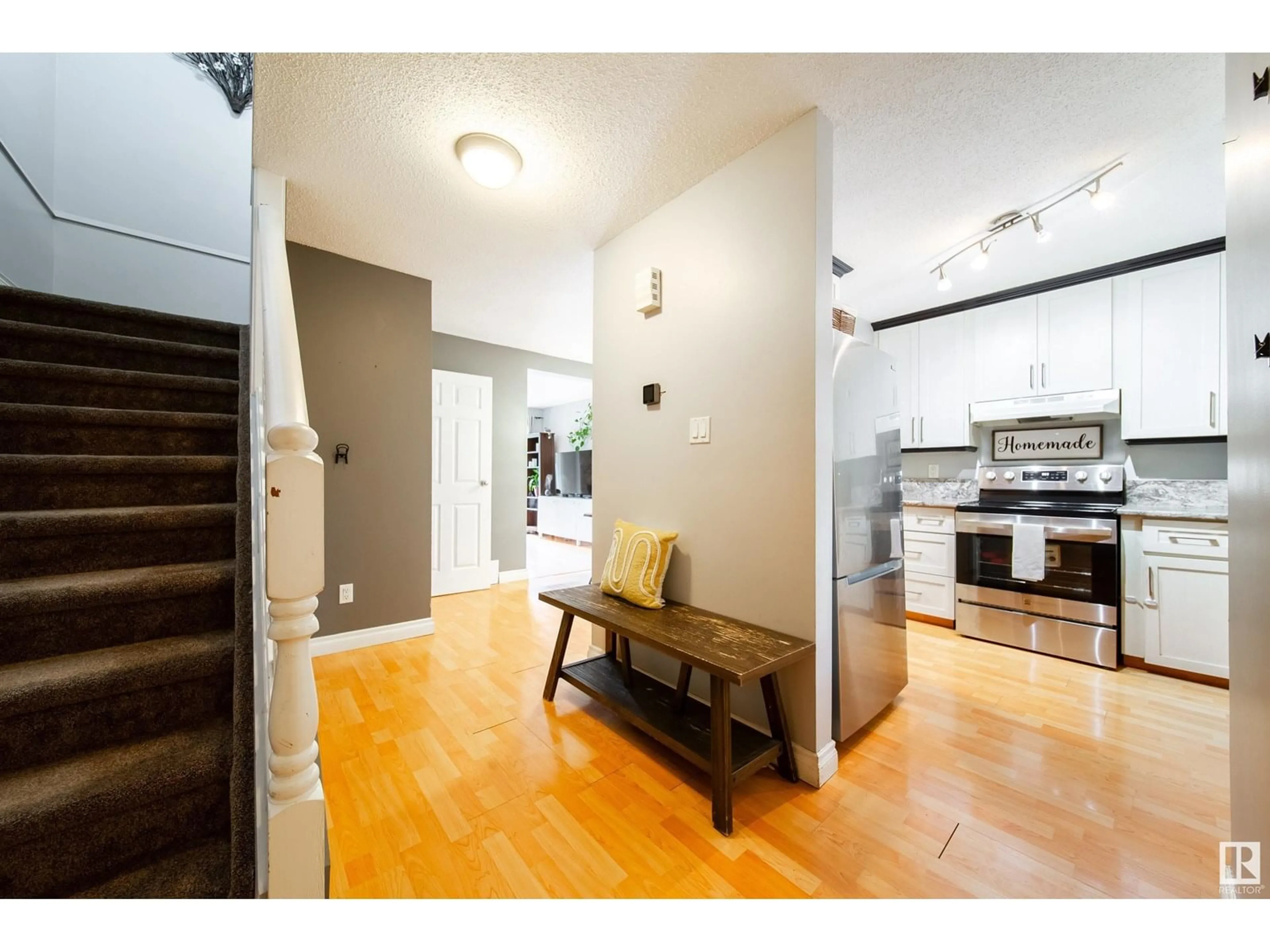 Indoor entryway for NW - 3301 142 AV, Edmonton Alberta T5Y1M9