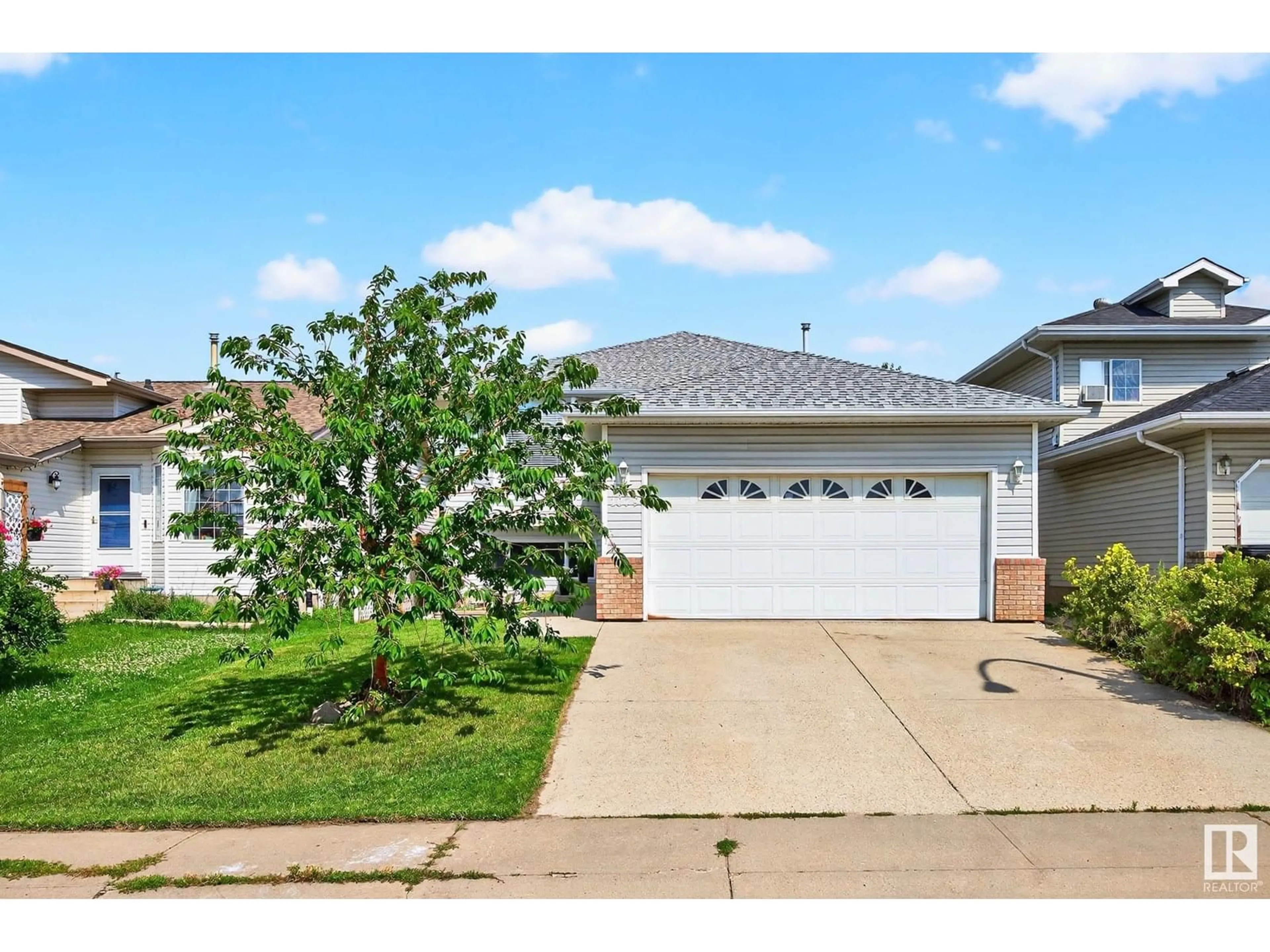 Home with vinyl exterior material, street for 1079 JONES CR, Edmonton Alberta T6L6Y1