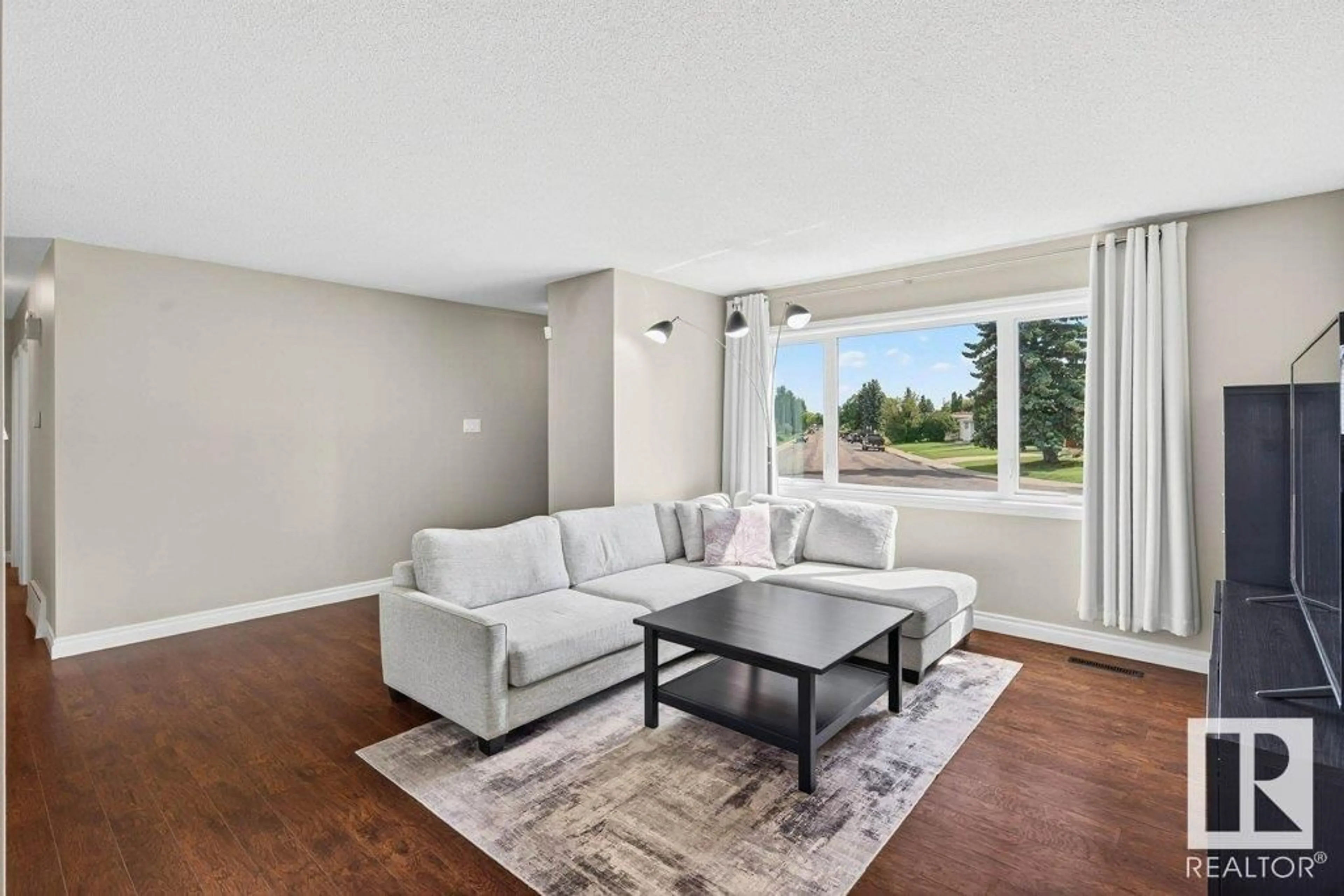 Living room with furniture, unknown for 5608 89 AV, Edmonton Alberta T6B0M5