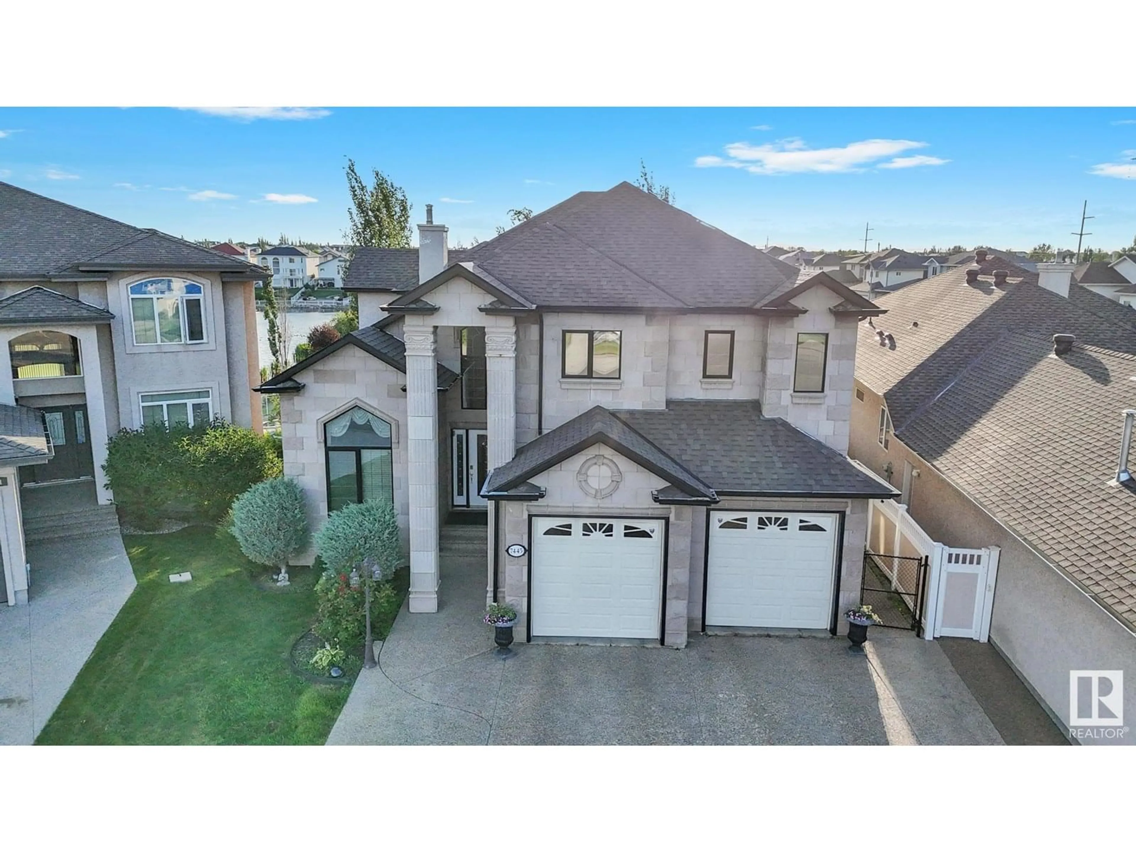 A pic from outside/outdoor area/front of a property/back of a property/a pic from drone, street for 7445 162 AV, Edmonton Alberta T5Z3S7