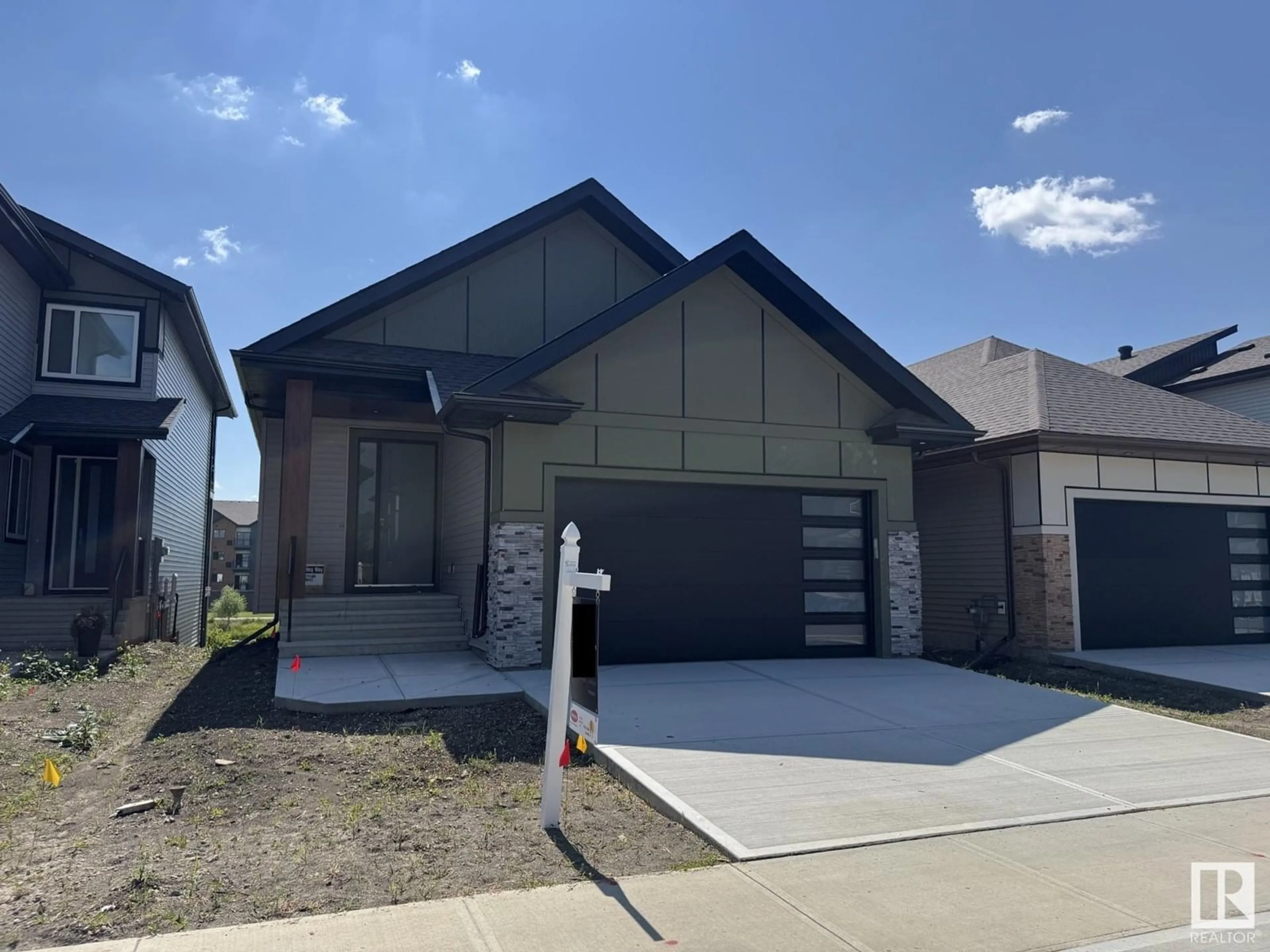 Home with brick exterior material, street for 21 STARLING WY, Fort Saskatchewan Alberta T8L1R5