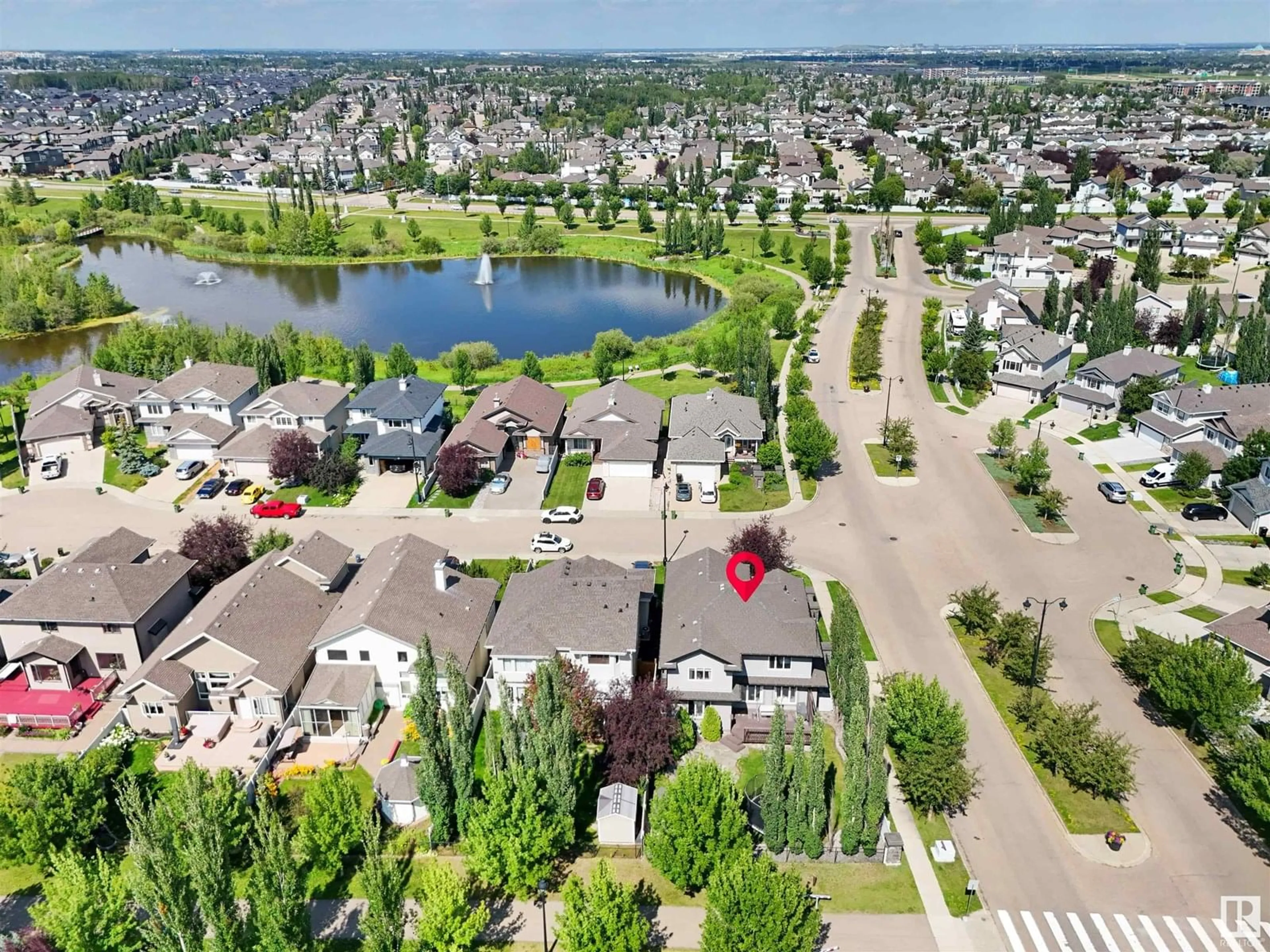 A pic from outside/outdoor area/front of a property/back of a property/a pic from drone, water/lake/river/ocean view for 20503 58 AV, Edmonton Alberta T6M2Z5