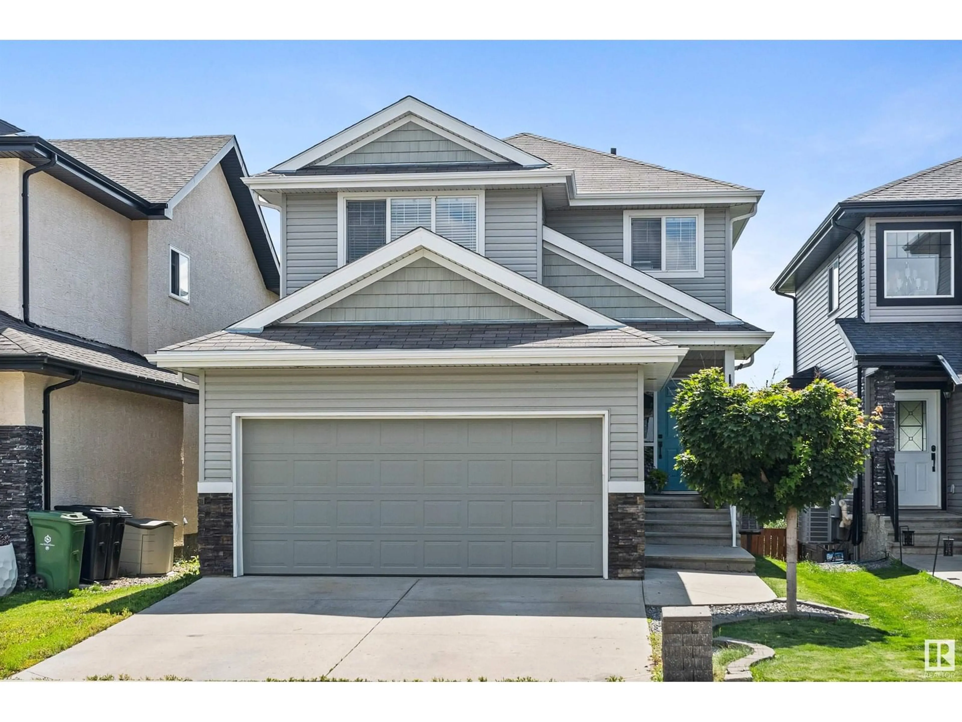 Home with vinyl exterior material, street for 5 CRANSTON PL, Fort Saskatchewan Alberta T8L0K7