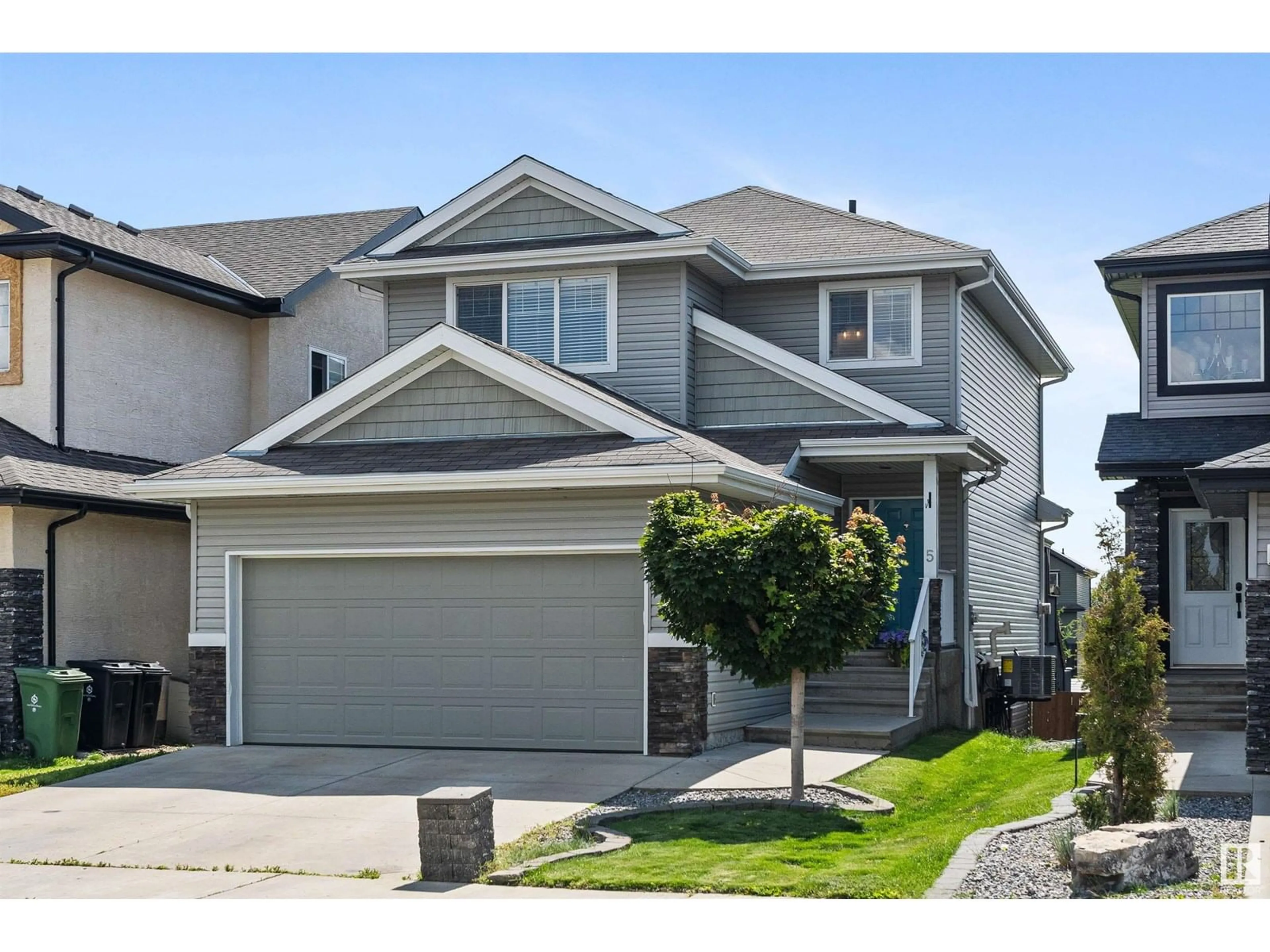 Home with vinyl exterior material, street for 5 CRANSTON PL, Fort Saskatchewan Alberta T8L0K7