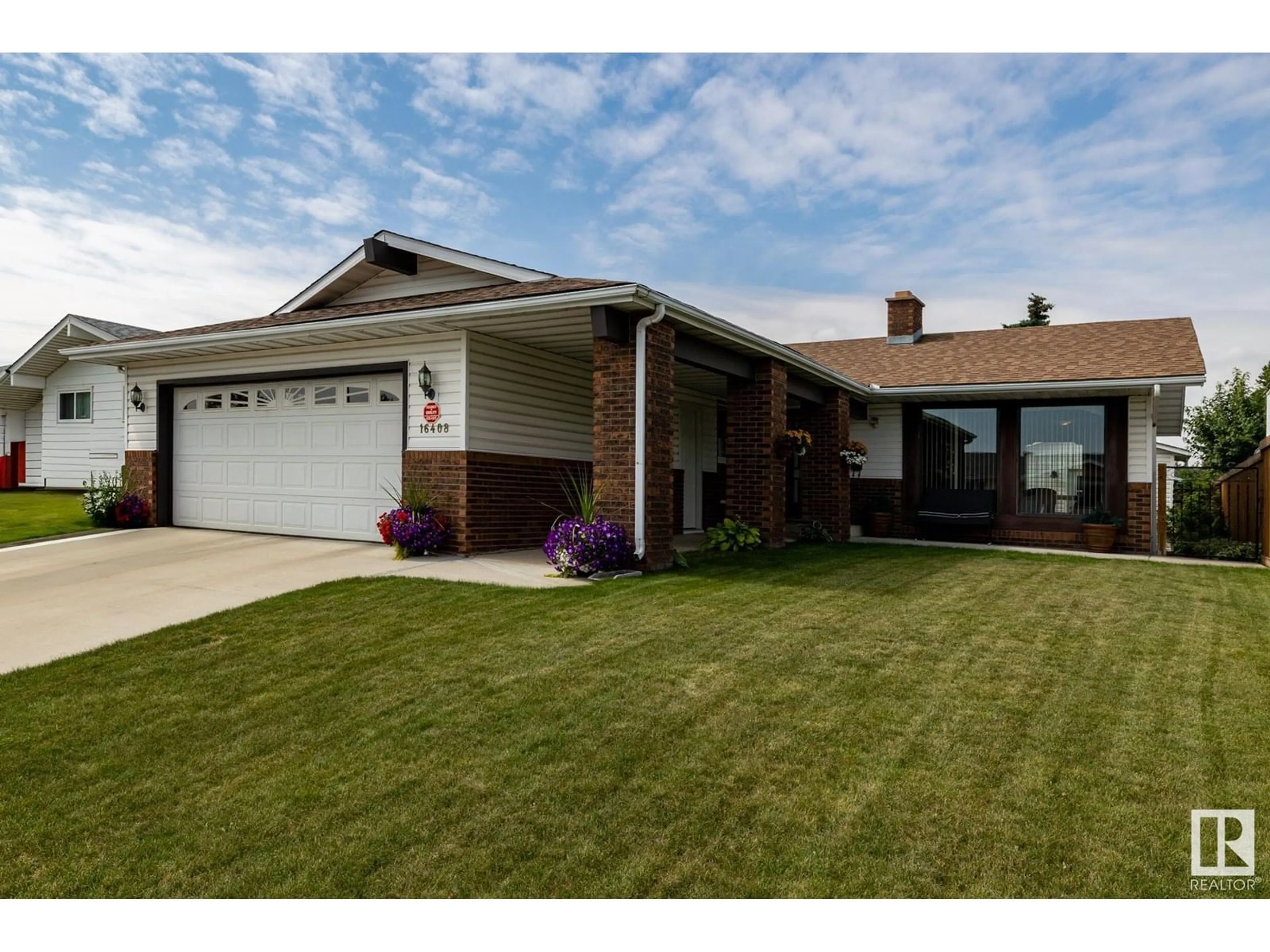 Home with brick exterior material, street for NW - 16408 102 ST, Edmonton Alberta T5X2P3