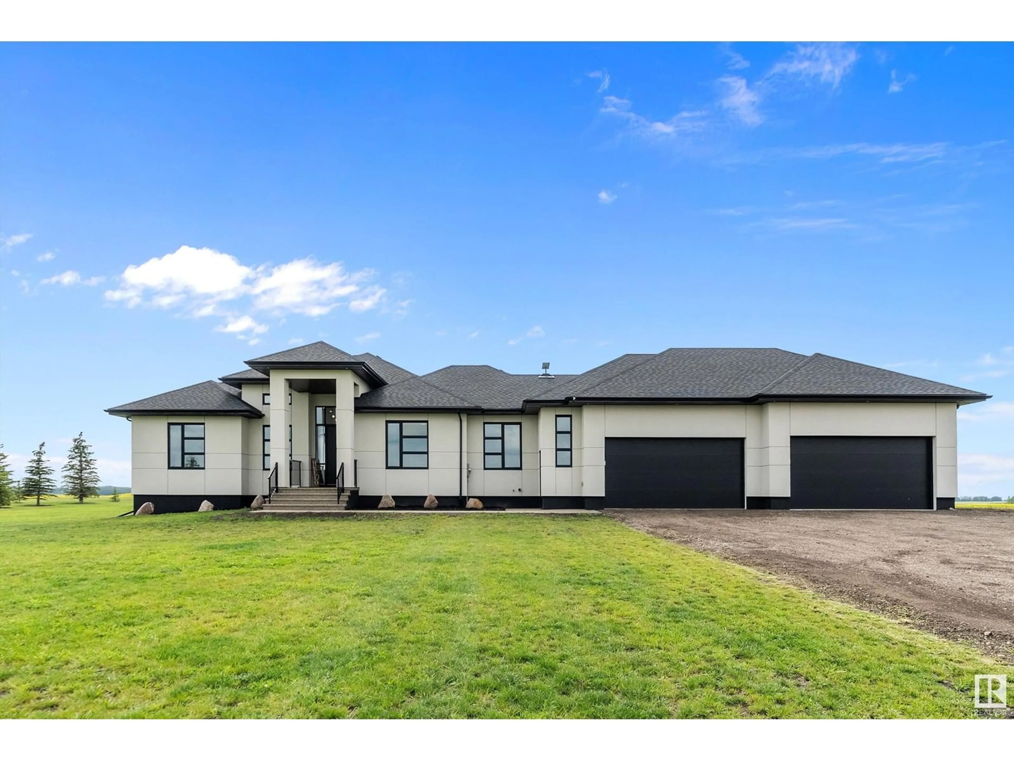 A pic from outside/outdoor area/front of a property/back of a property/a pic from drone, unknown for 70 50428 RGE ROAD 234, Rural Leduc County Alberta T4X0L7