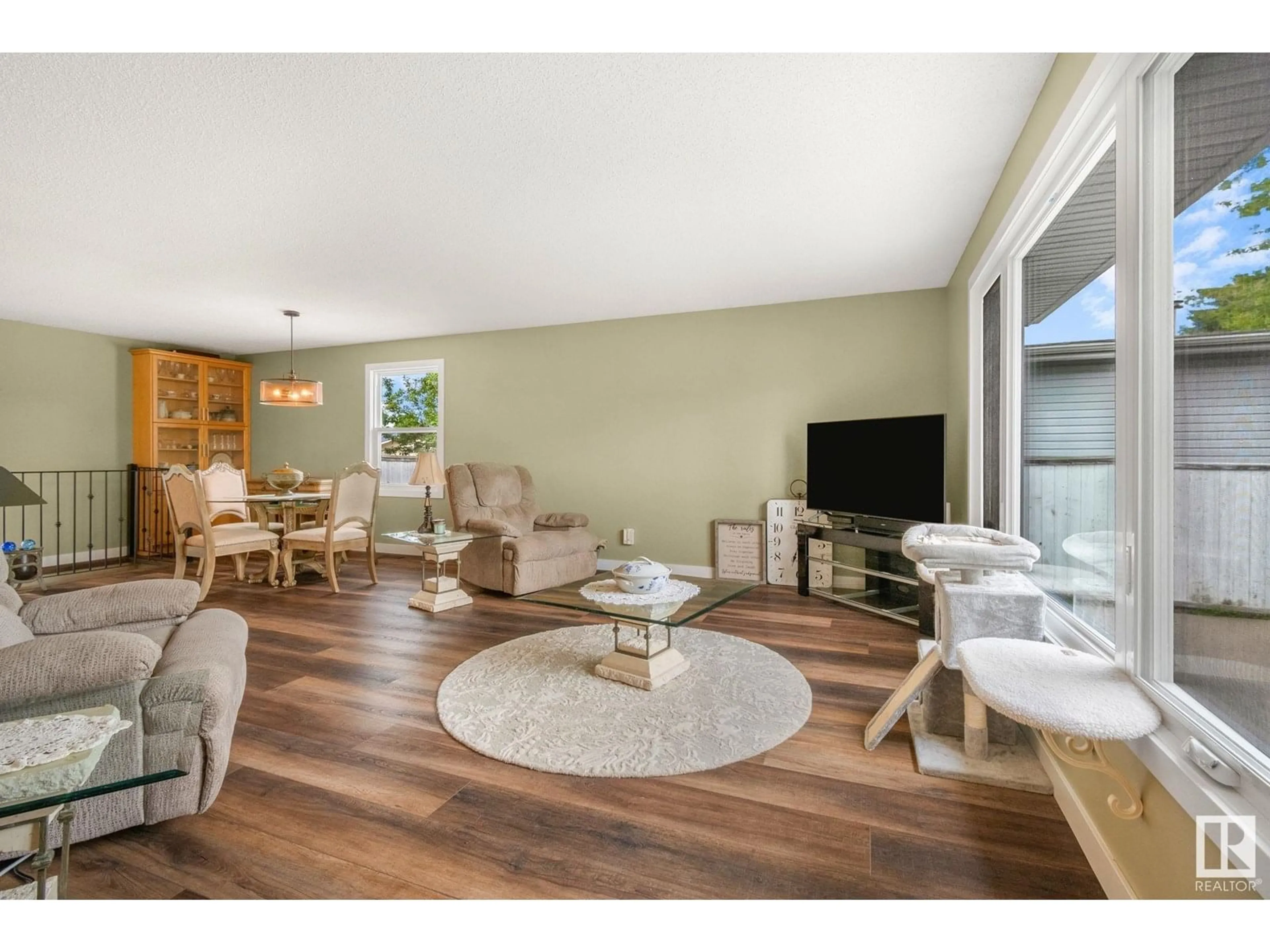 Living room with furniture, wood/laminate floor for 4303 35 AV, Leduc Alberta T9E6A9