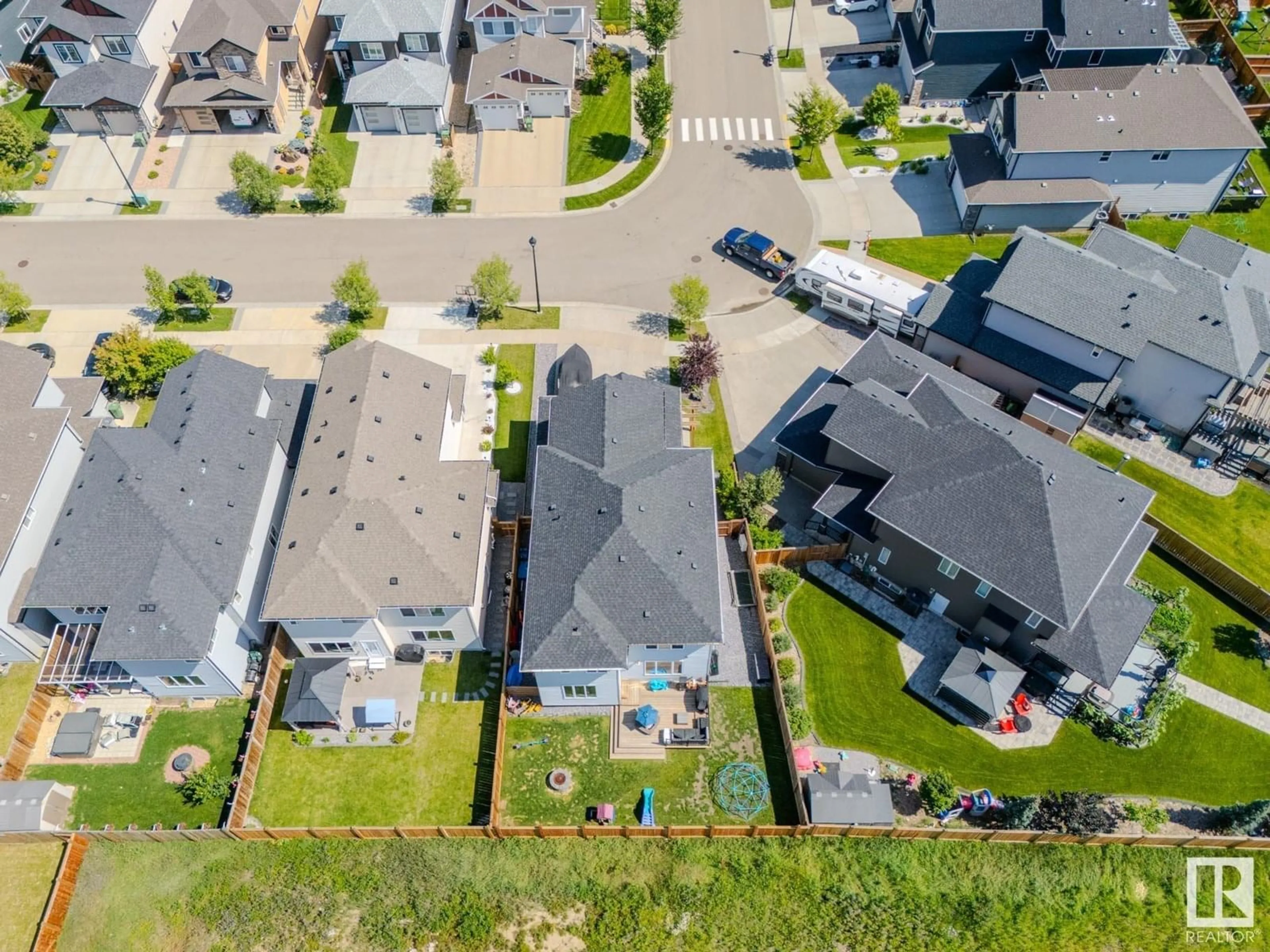 A pic from outside/outdoor area/front of a property/back of a property/a pic from drone, street for 5536 POIRIER WAY, Beaumont Alberta T4X2B3