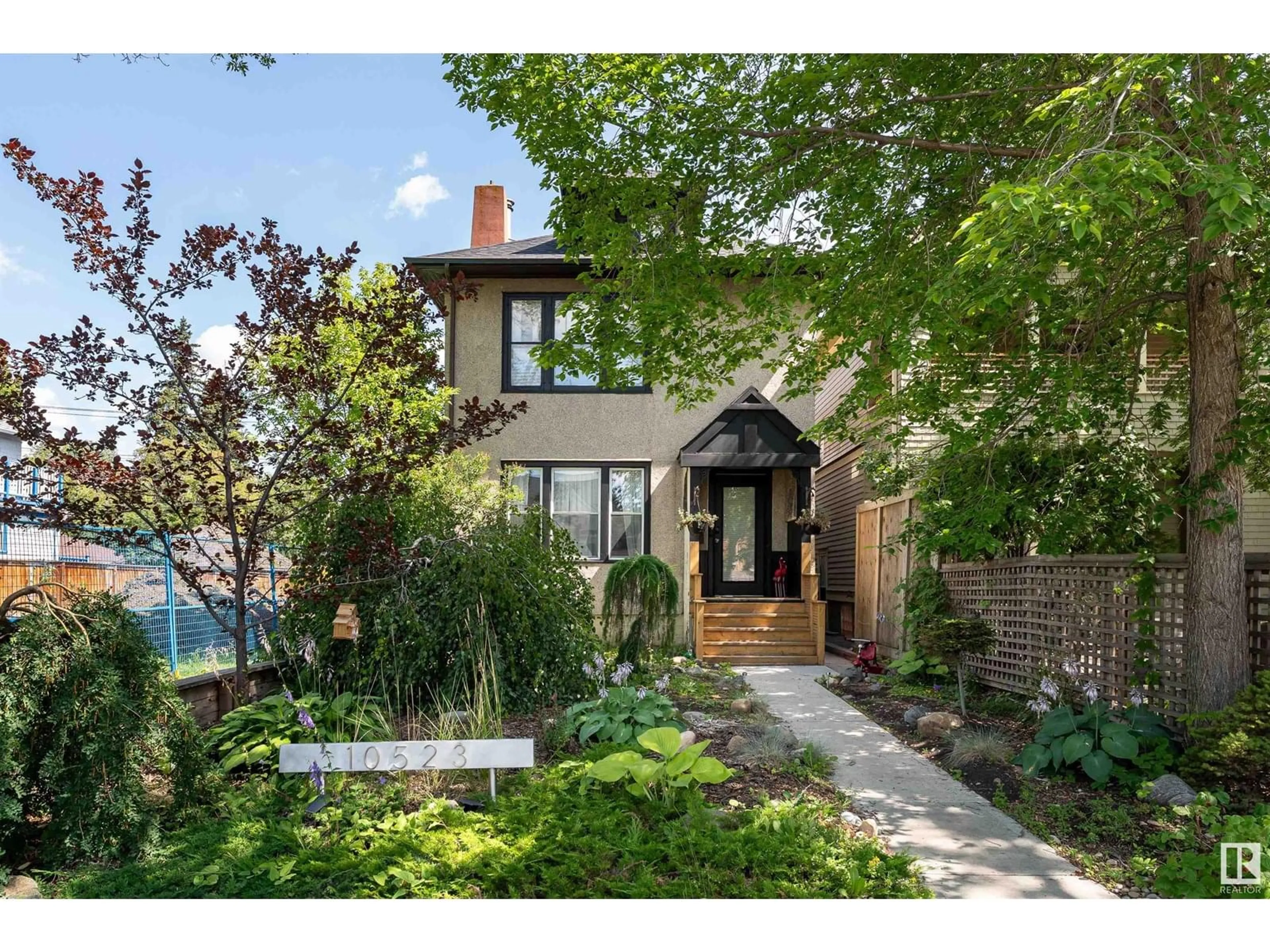 Home with brick exterior material, street for NW - 10523 127 ST, Edmonton Alberta T5N1V8