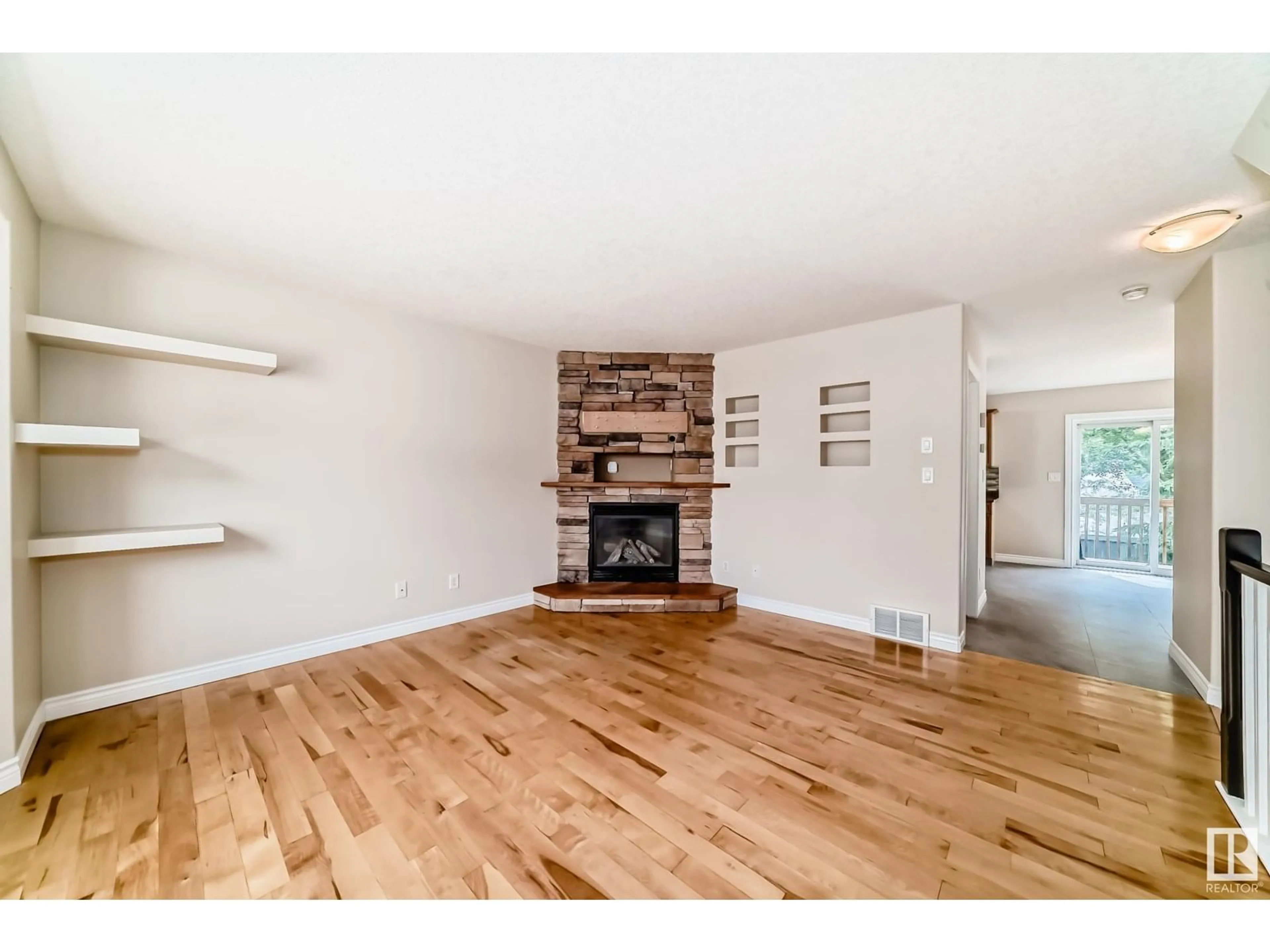 Living room with furniture, wood/laminate floor for #2 - 17839 99 ST, Edmonton Alberta T5X6A6