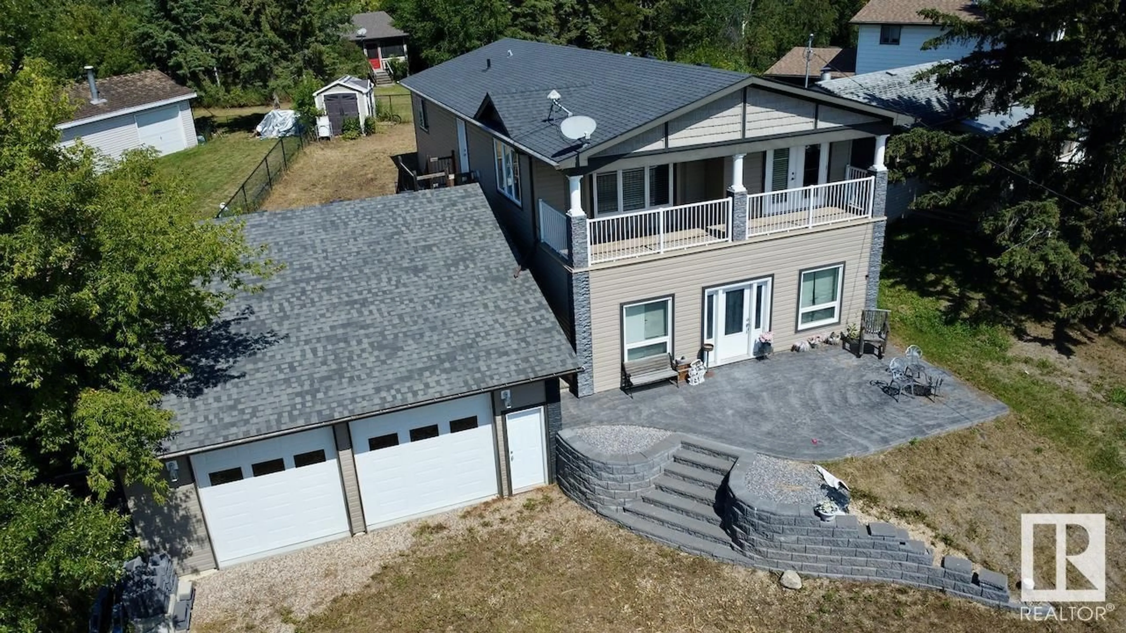 A pic from outside/outdoor area/front of a property/back of a property/a pic from drone, building for 525 5 ST, Rural Lac Ste. Anne County Alberta T0E1A0