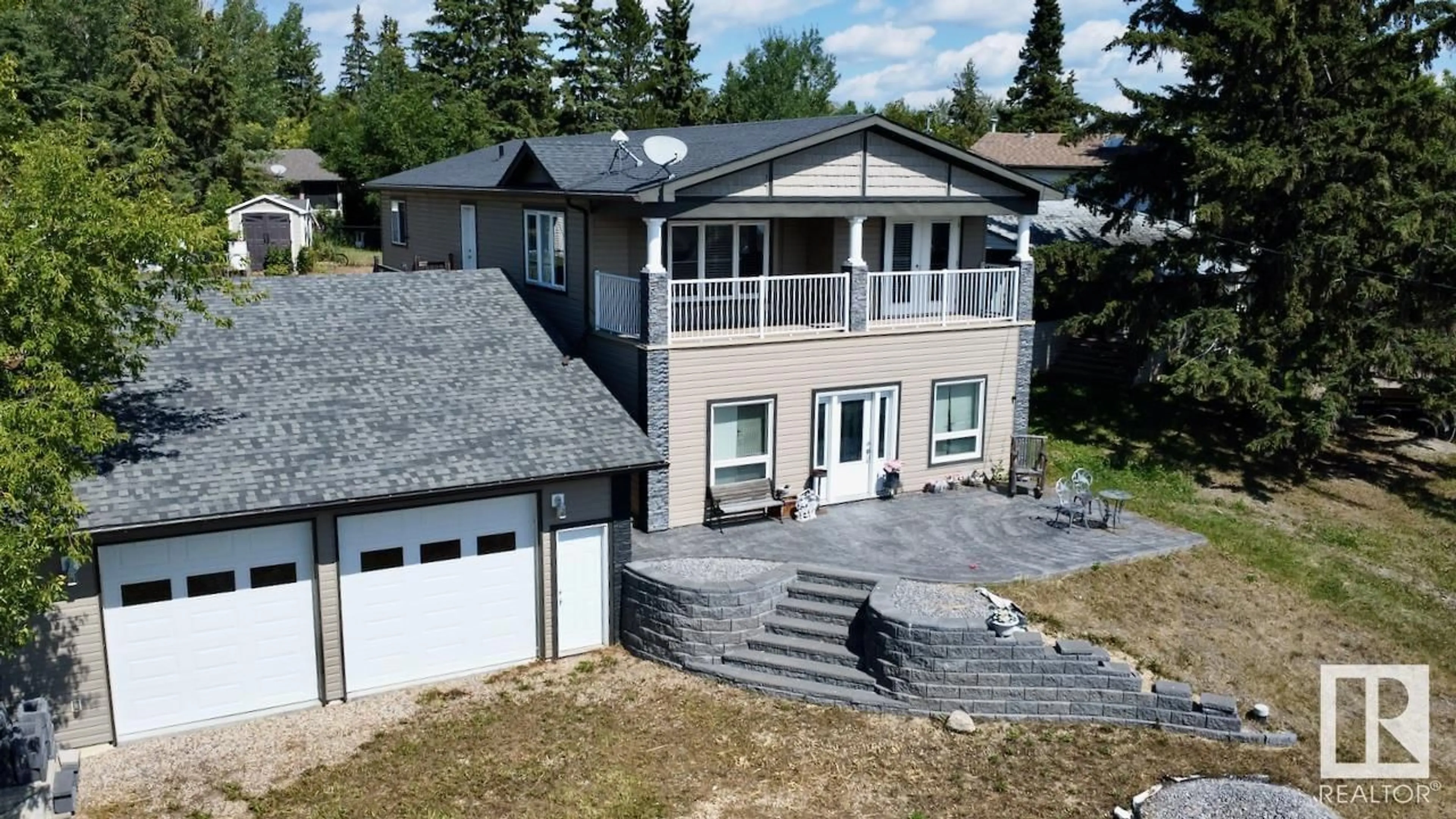 A pic from outside/outdoor area/front of a property/back of a property/a pic from drone, building for 525 5 ST, Rural Lac Ste. Anne County Alberta T0E1A0
