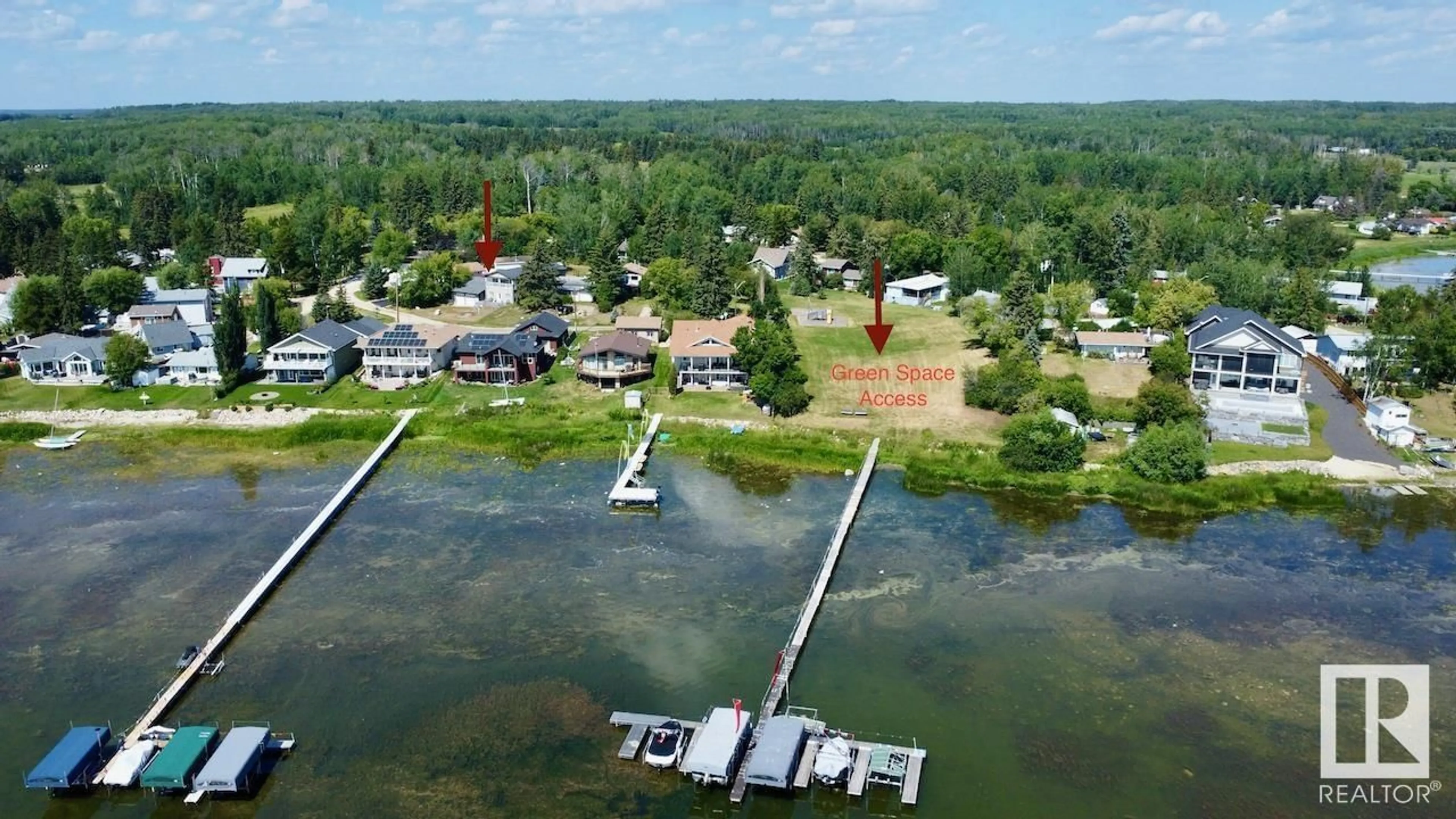 A pic from outside/outdoor area/front of a property/back of a property/a pic from drone, water/lake/river/ocean view for 525 5 ST, Rural Lac Ste. Anne County Alberta T0E1A0