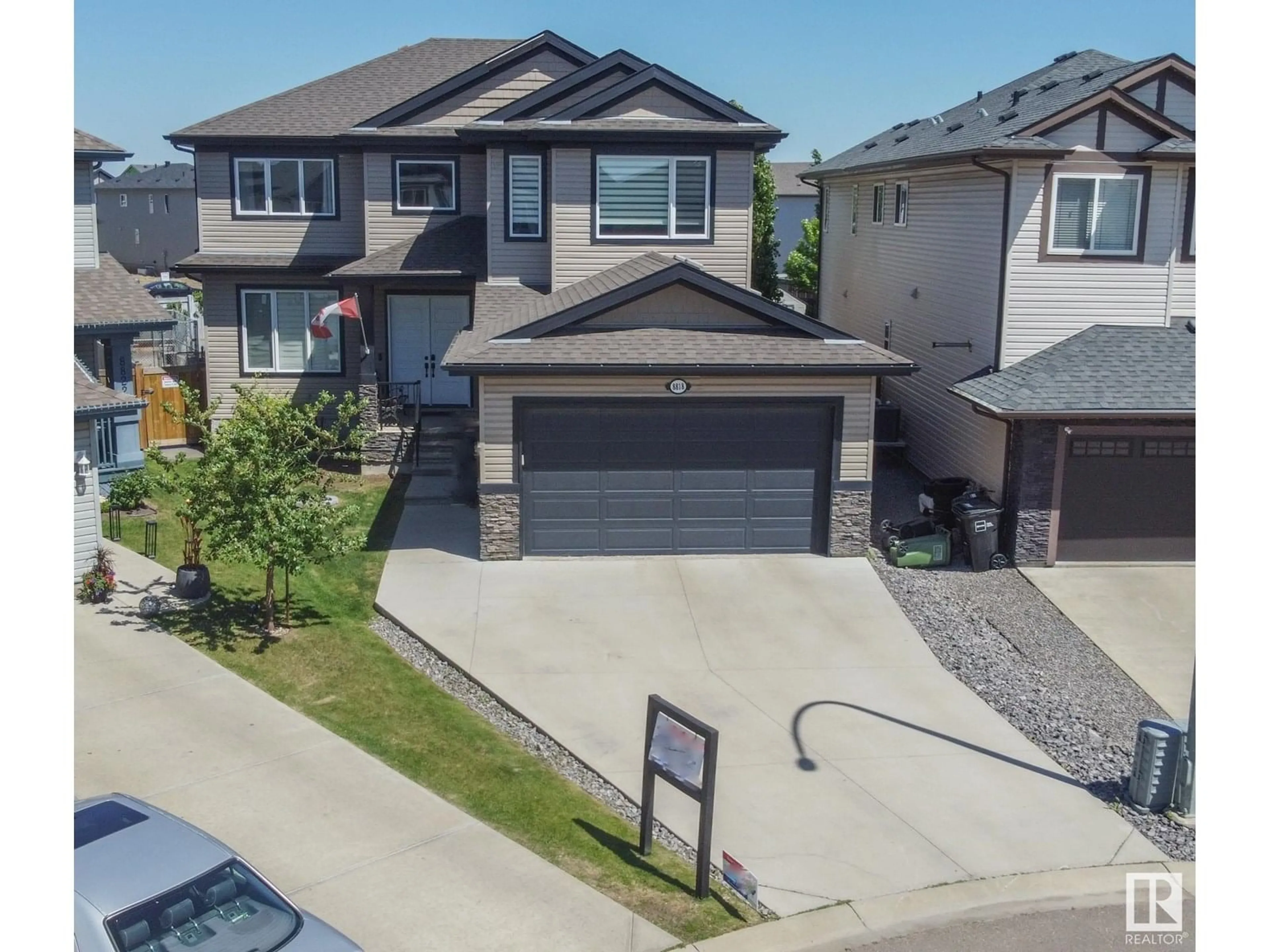 A pic from outside/outdoor area/front of a property/back of a property/a pic from drone, street for NW - 8818 180A AV, Edmonton Alberta T5Z0J4