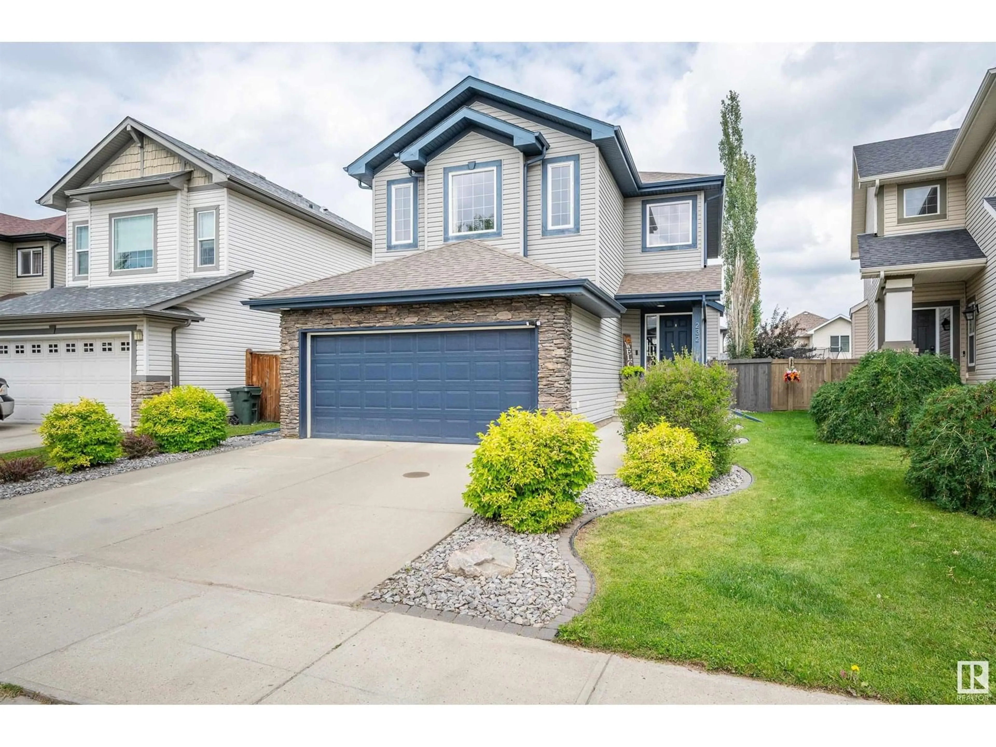 Home with vinyl exterior material, street for 232 HARVEST RIDGE DR, Spruce Grove Alberta T7X0E9