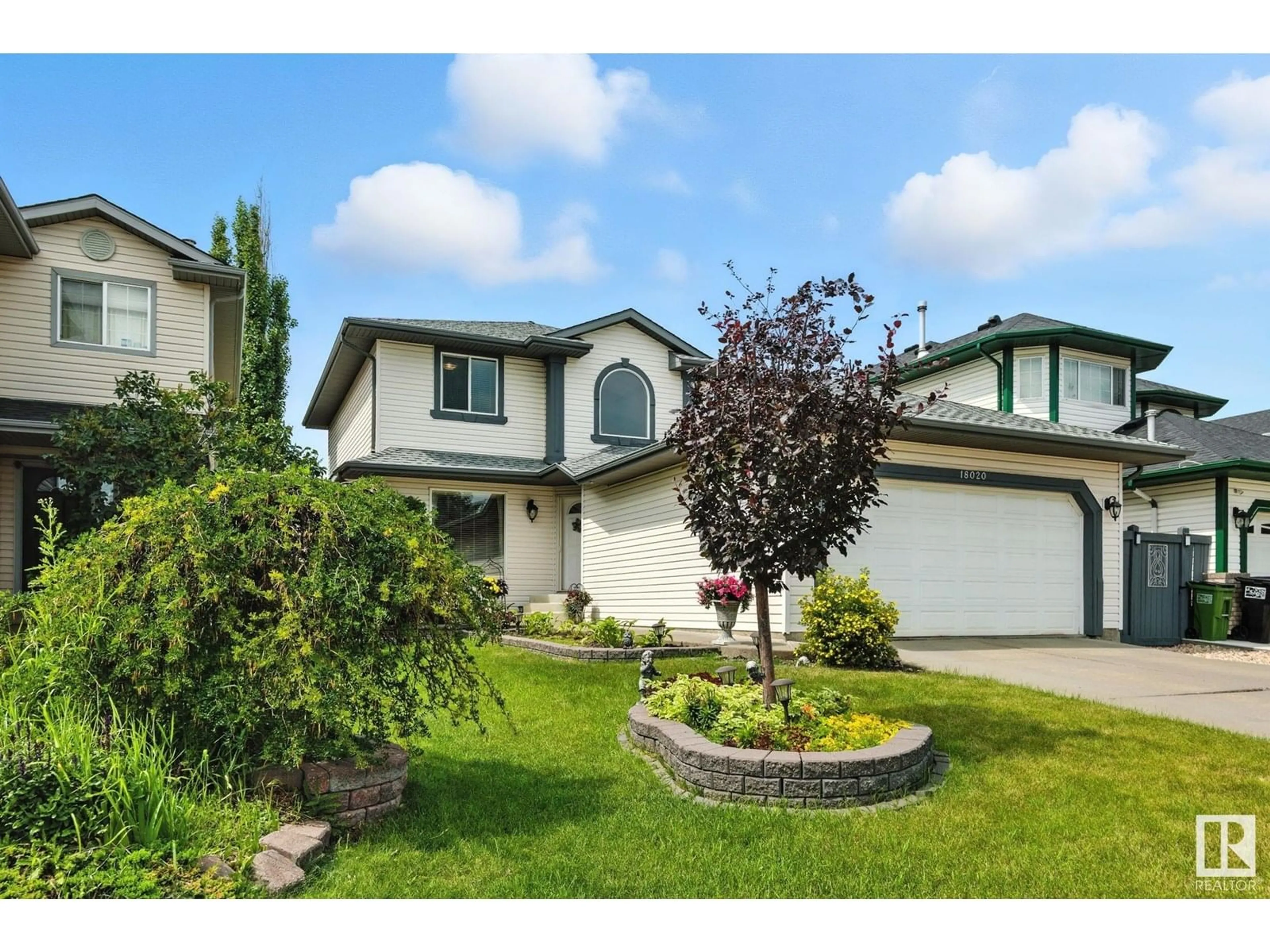 Home with vinyl exterior material, street for NW - 18020 101 ST, Edmonton Alberta T5X5Z8