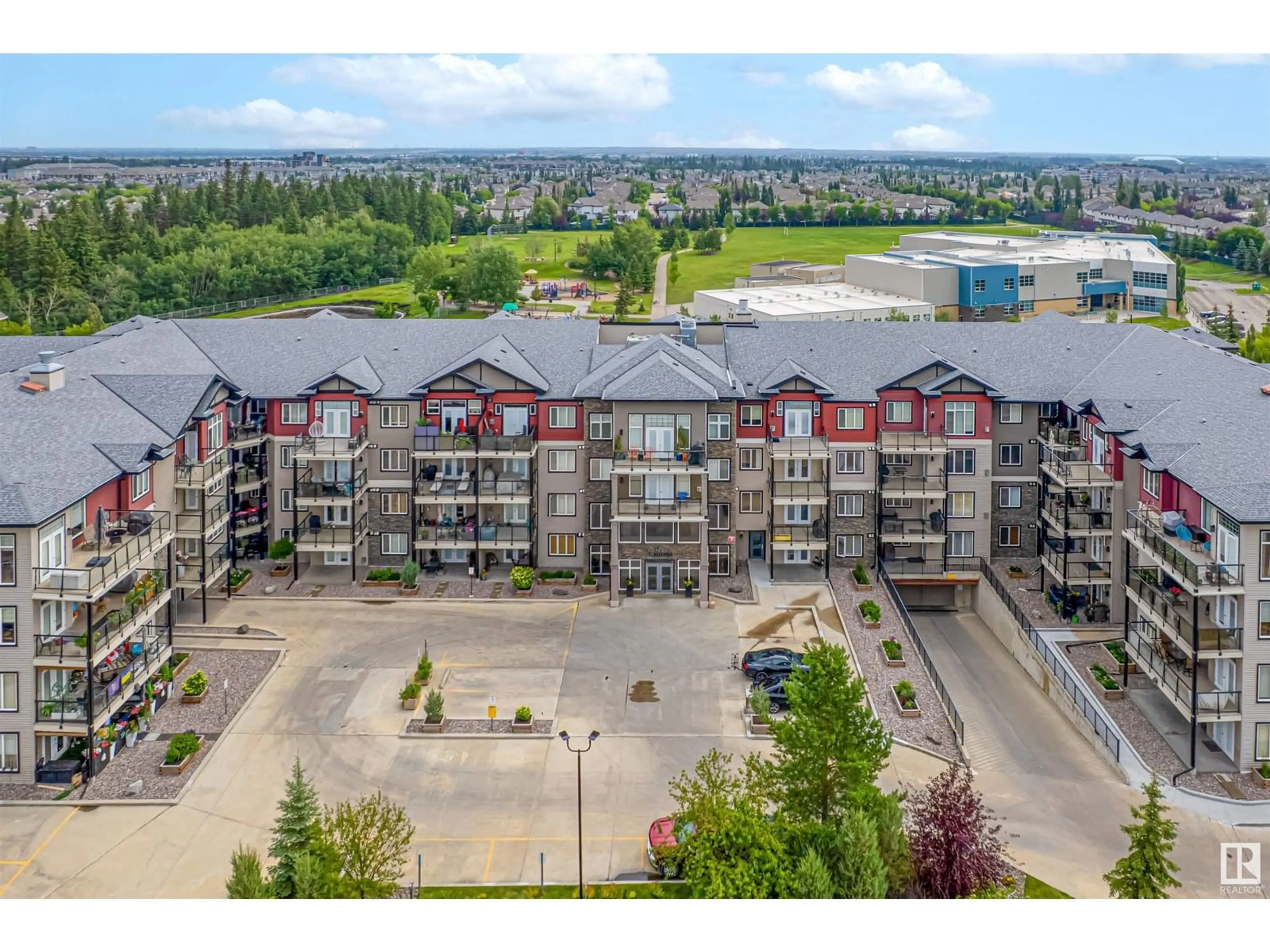 A pic from outside/outdoor area/front of a property/back of a property/a pic from drone, water/lake/river/ocean view for #419 - 12408 15 AV, Edmonton Alberta T6W1X2