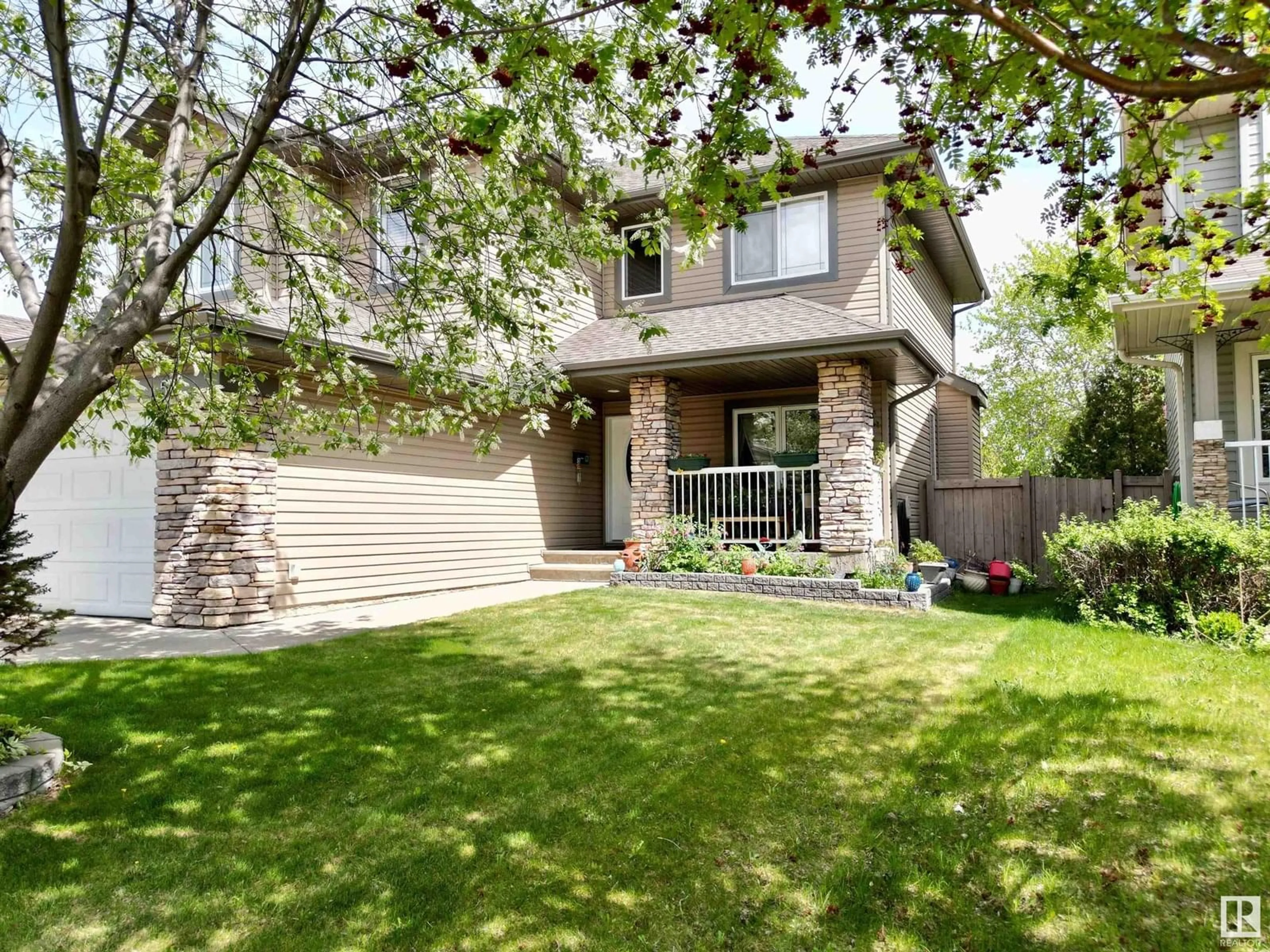 Home with brick exterior material, street for 57 HOMESTEAD CRESCENT, Edmonton Alberta T5A2Y1