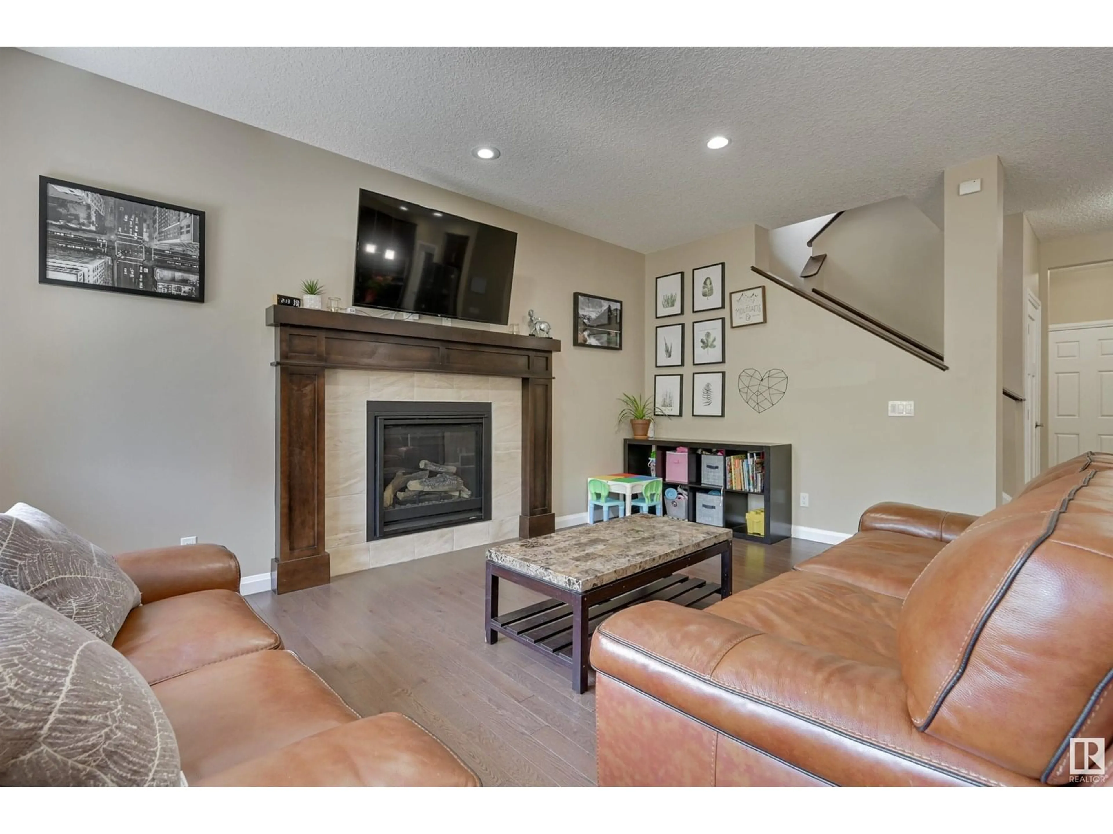 Living room with furniture, unknown for 6127 175 AV, Edmonton Alberta T5Y3N7