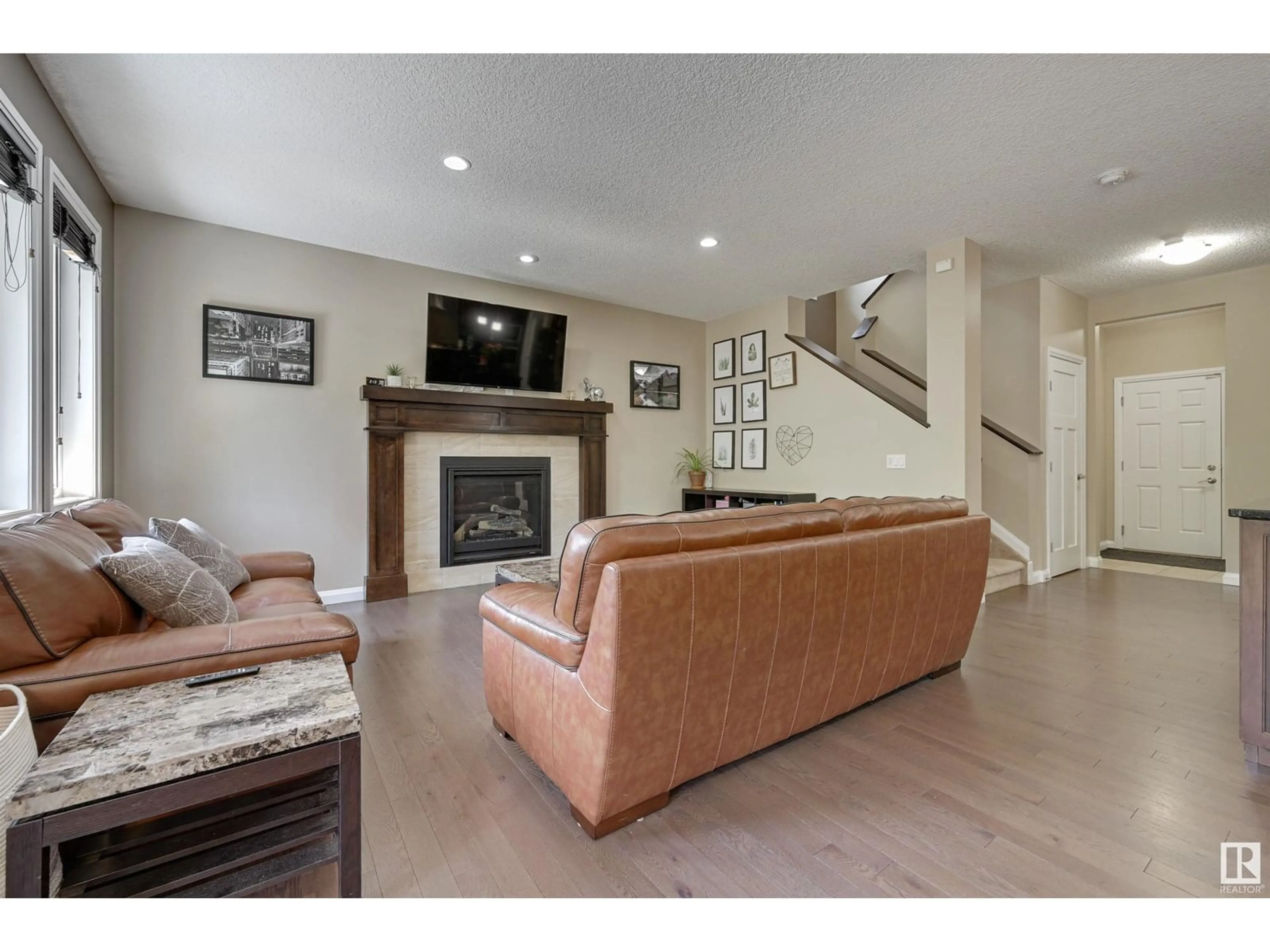 Living room with furniture, unknown for 6127 175 AV, Edmonton Alberta T5Y3N7