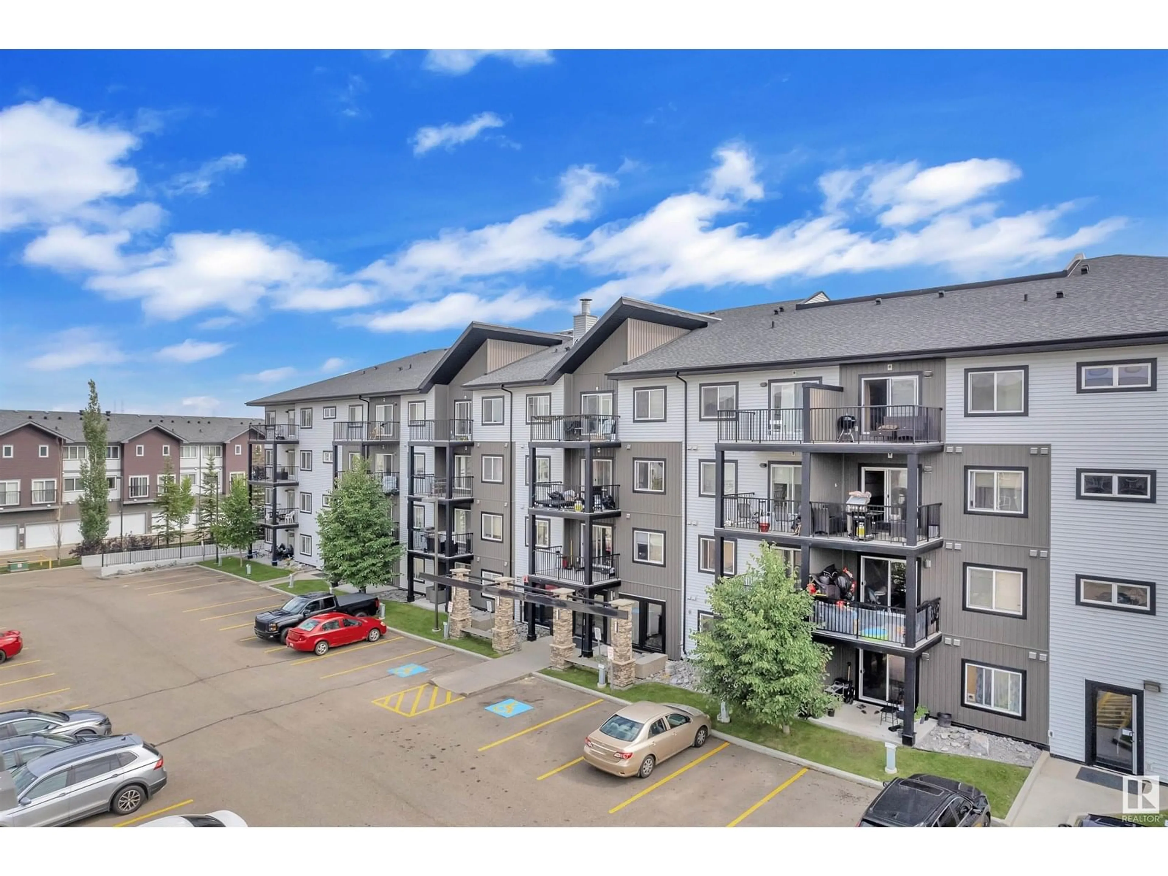 A pic from outside/outdoor area/front of a property/back of a property/a pic from drone, unknown for #303 - 3353 16A AV, Edmonton Alberta T6T0V4